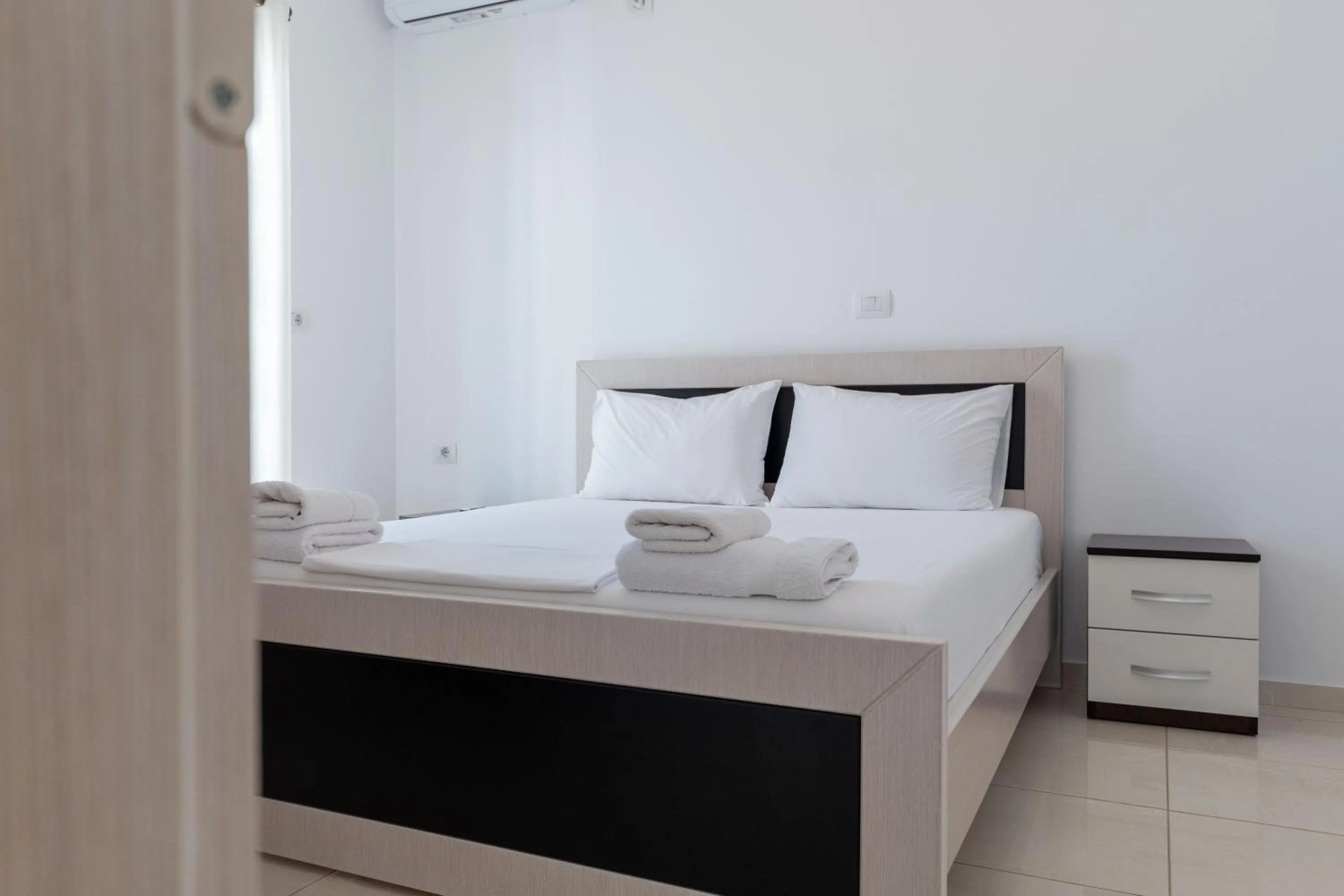 Bed in Apartments Aktea