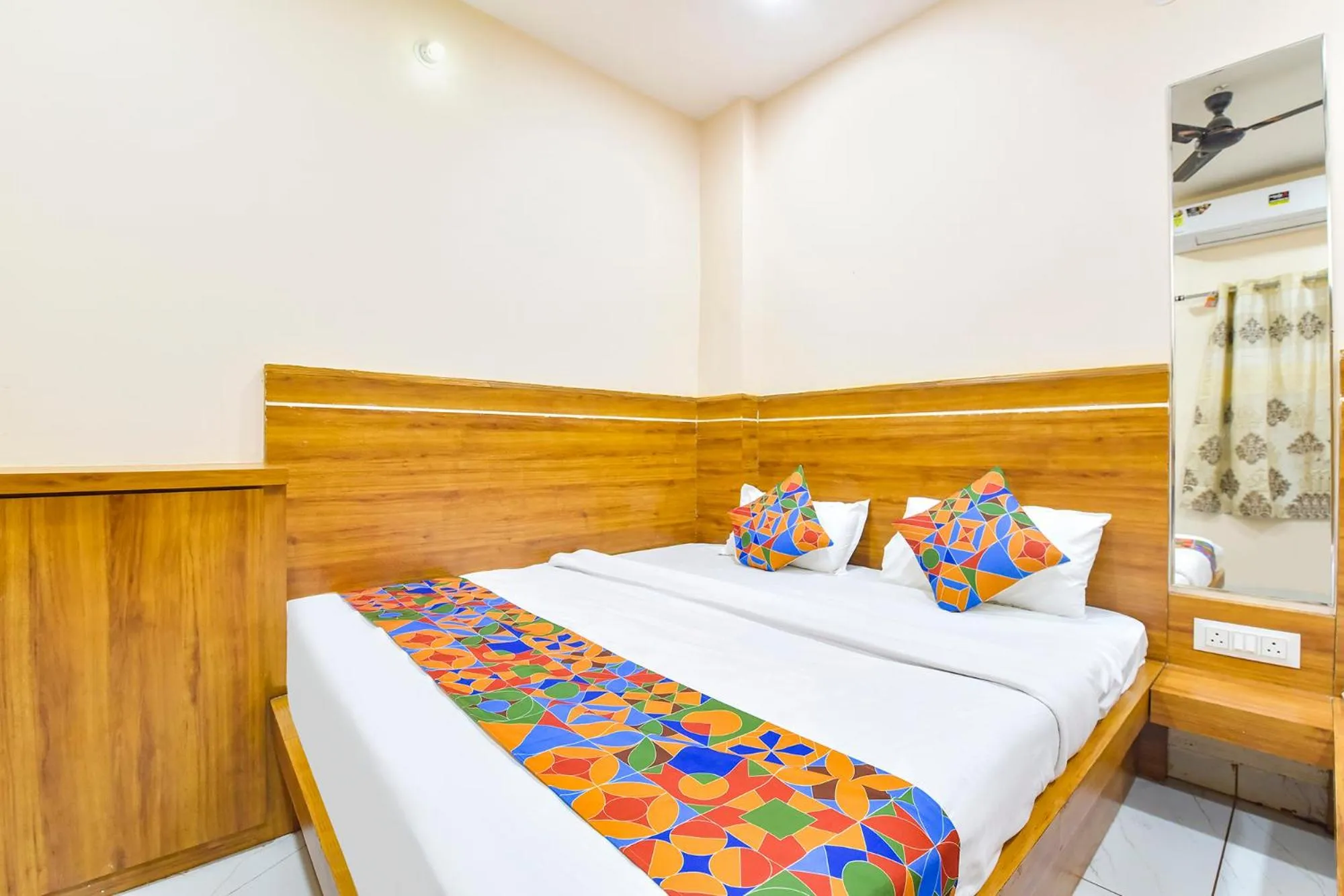 Bed in FabHotel Somnath