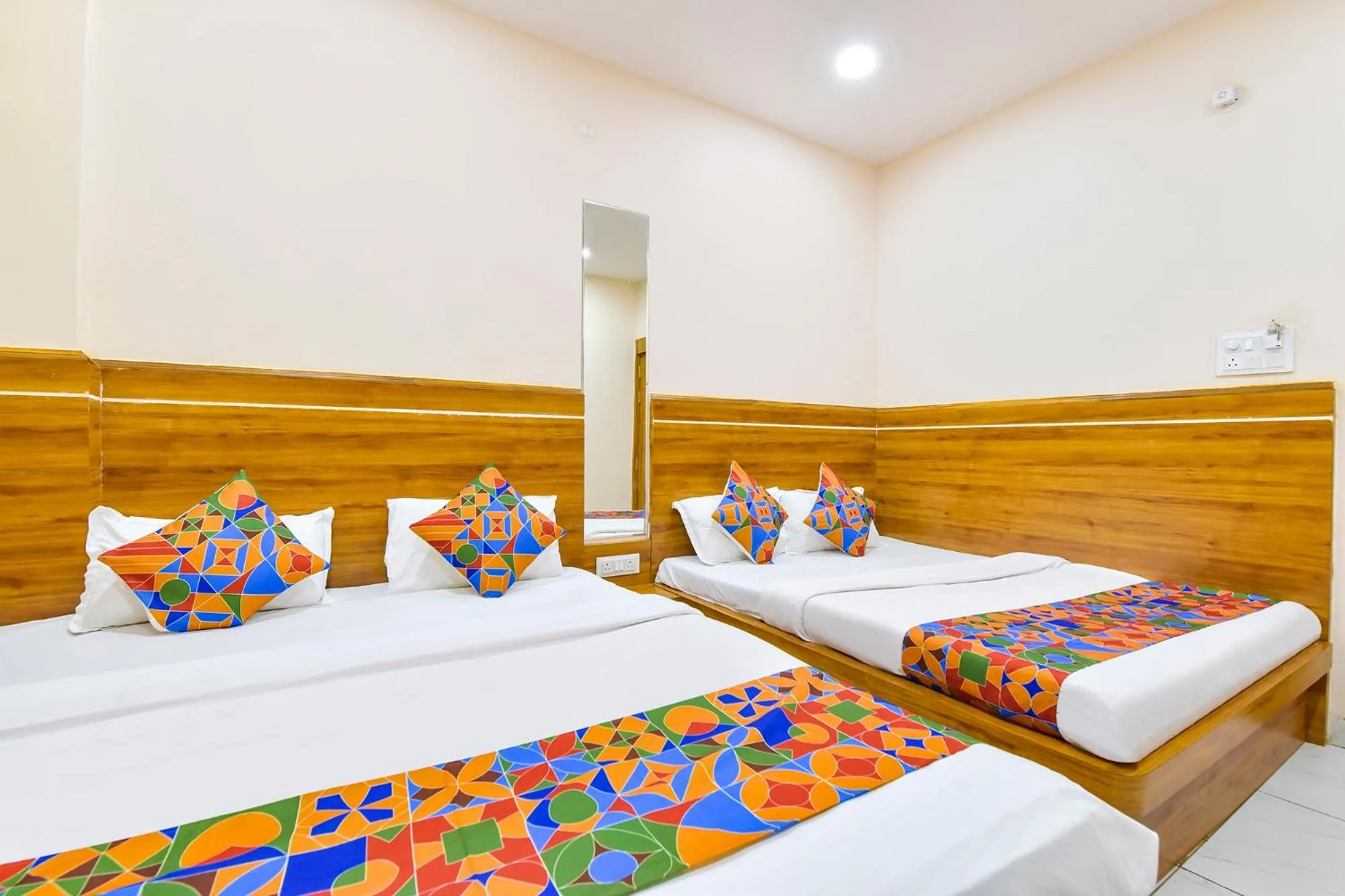 Bed in FabHotel Somnath