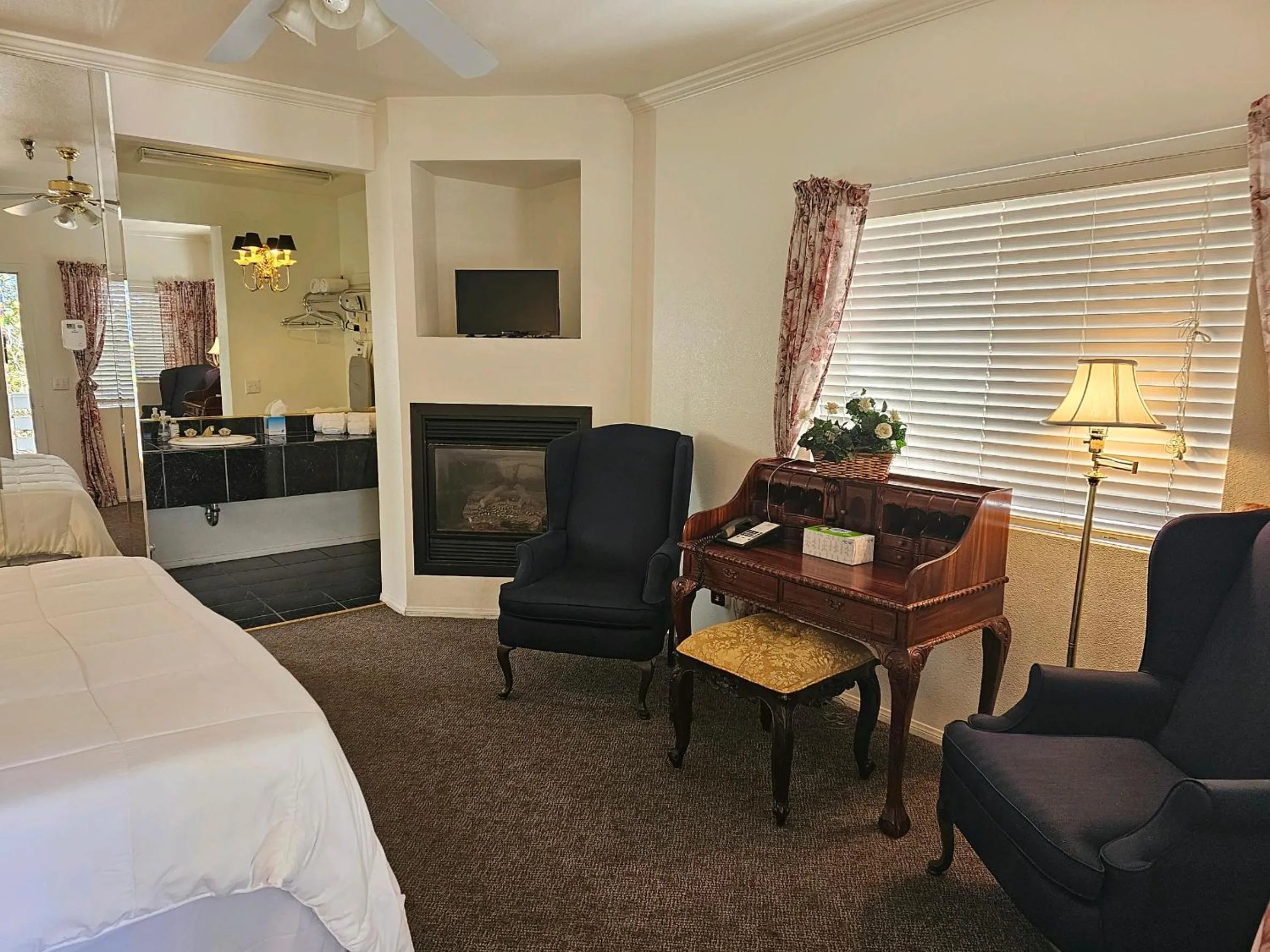 Seating area, Bed in Alhatti Christian Resort