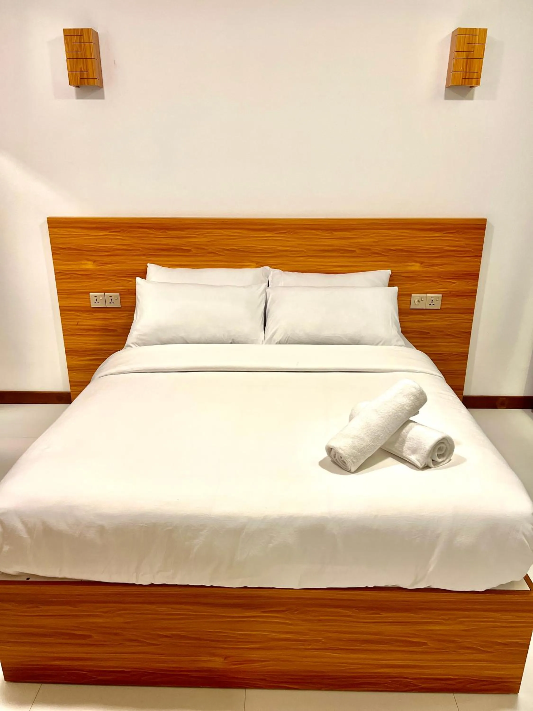 Bed in Vilu Residence