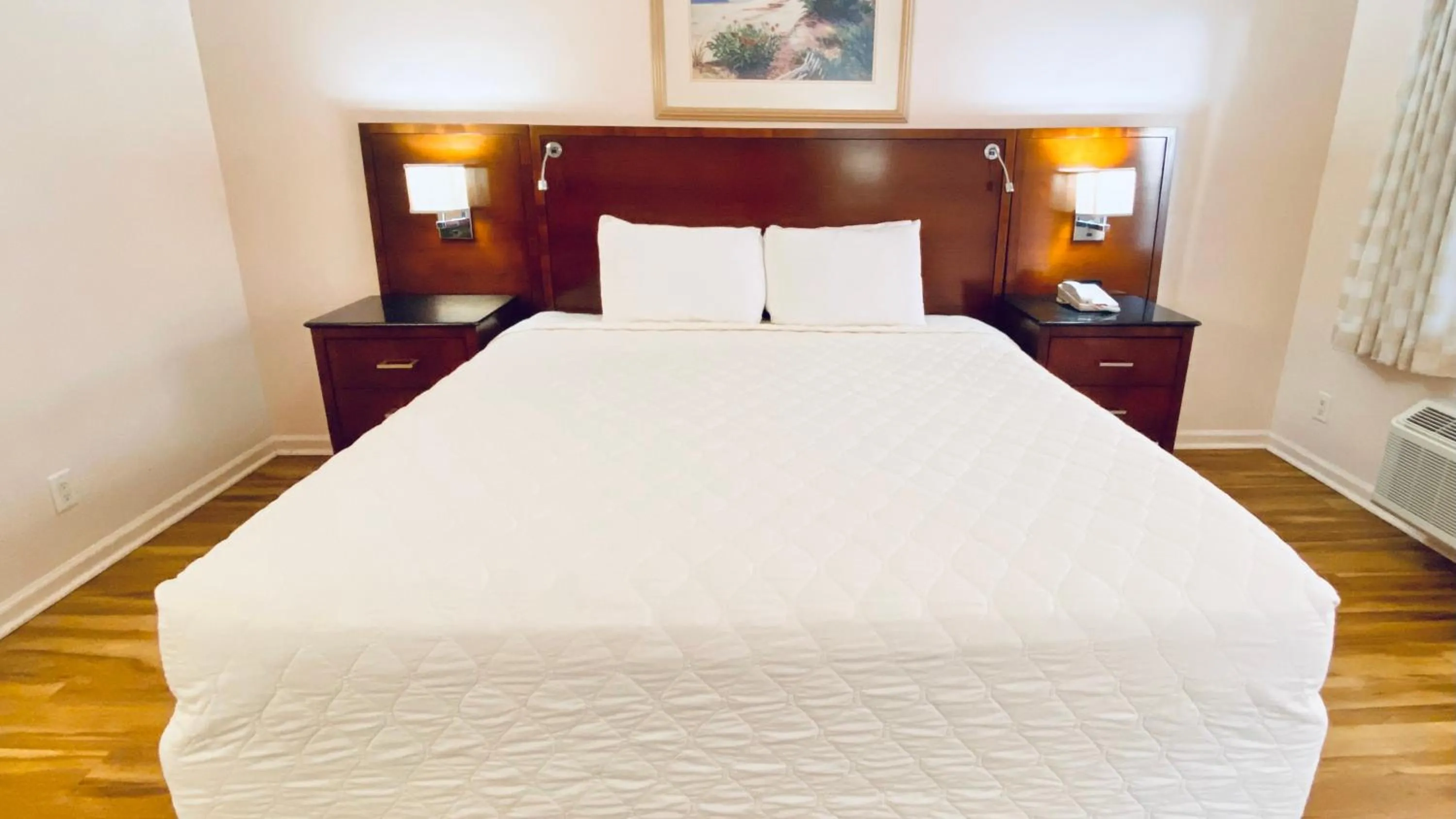 Bed in Royal Inn Hotel