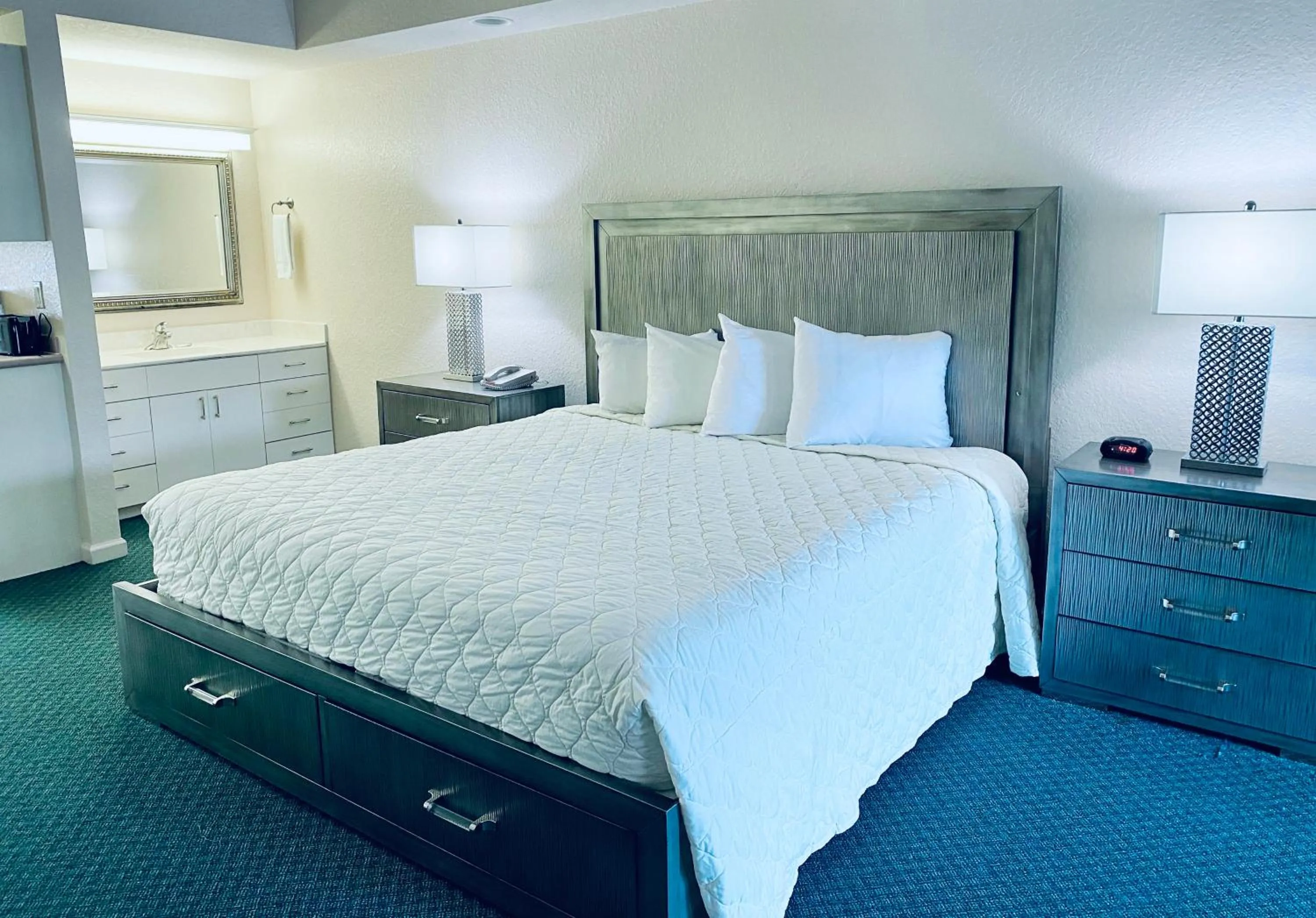 Shower, Bed in Royal Inn Hotel