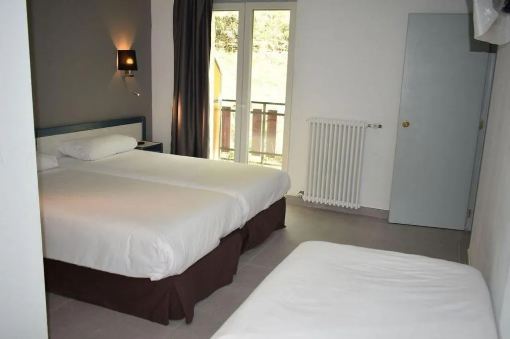 Bed in HOTEL VICTORIA