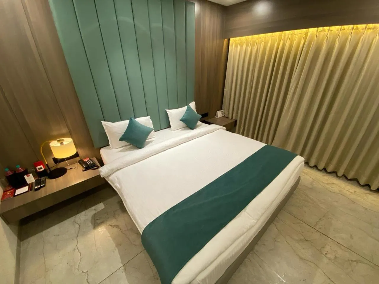 Bed in Lords Eco Inn Navsari