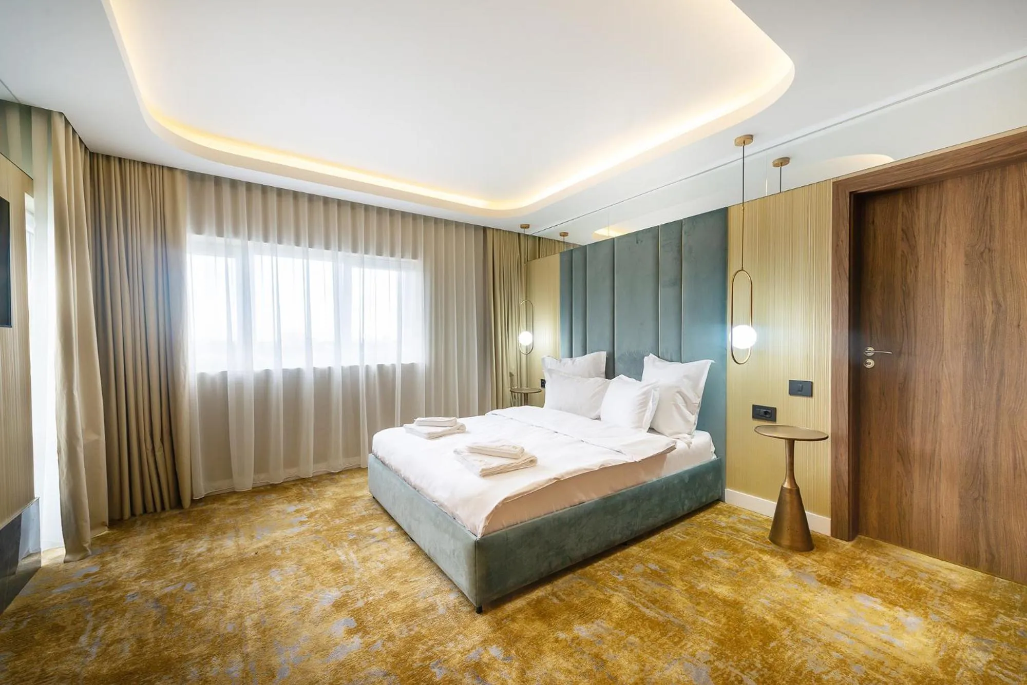 Bed in Yasu Luxury Rooms