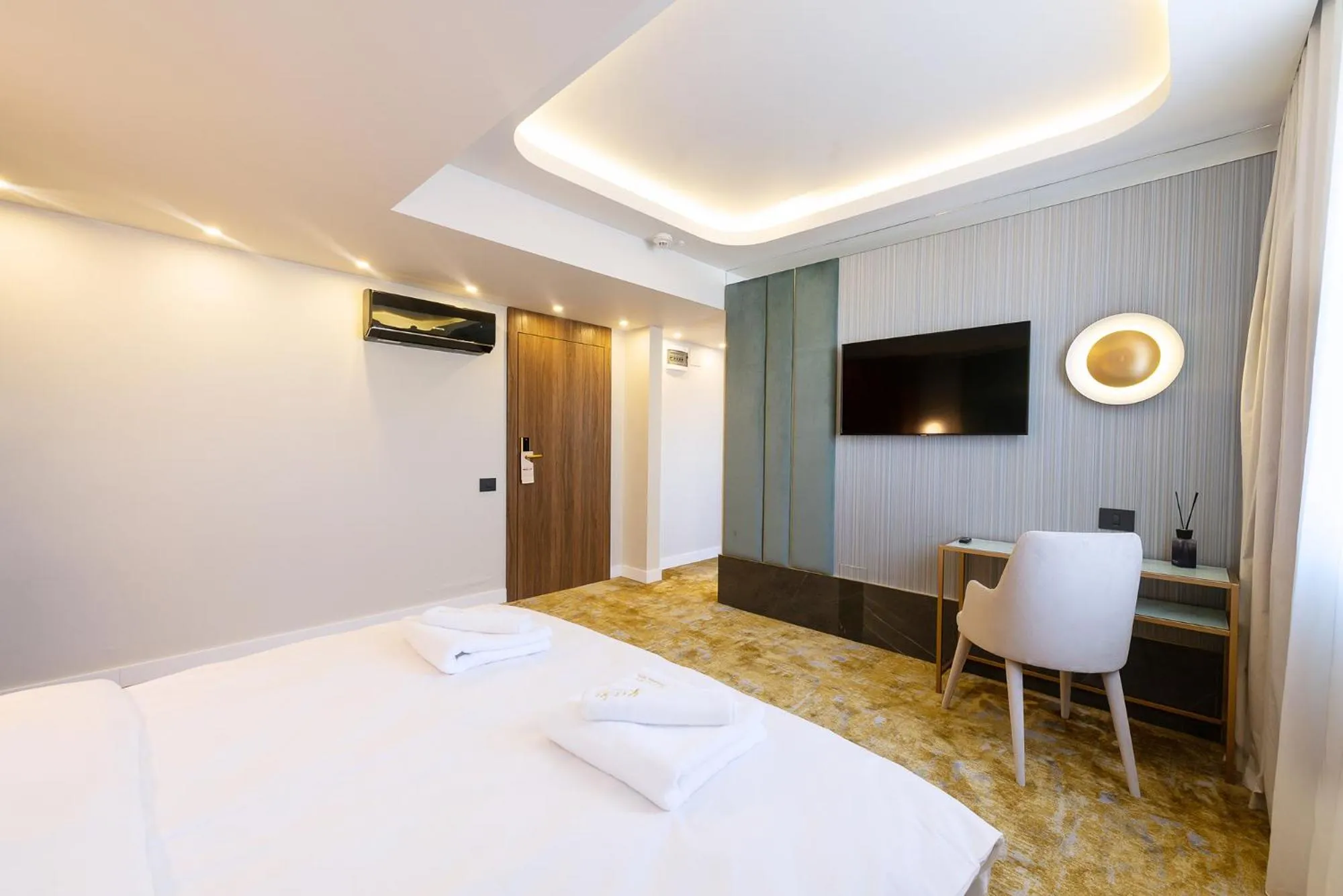 Bed in Yasu Luxury Rooms