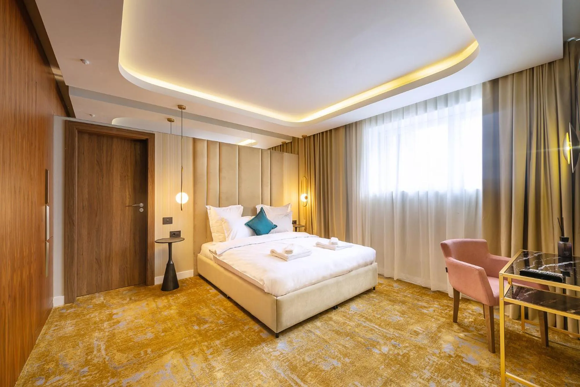 Bed in Yasu Luxury Rooms