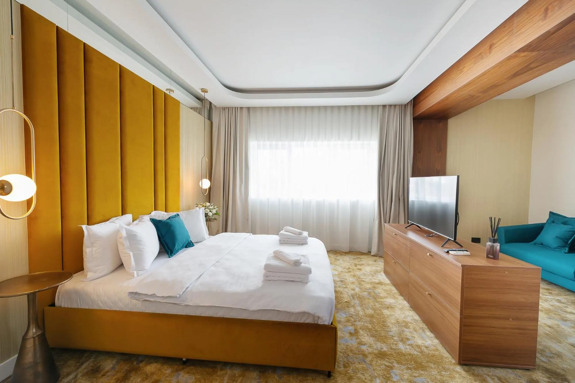 Bed in Yasu Luxury Rooms