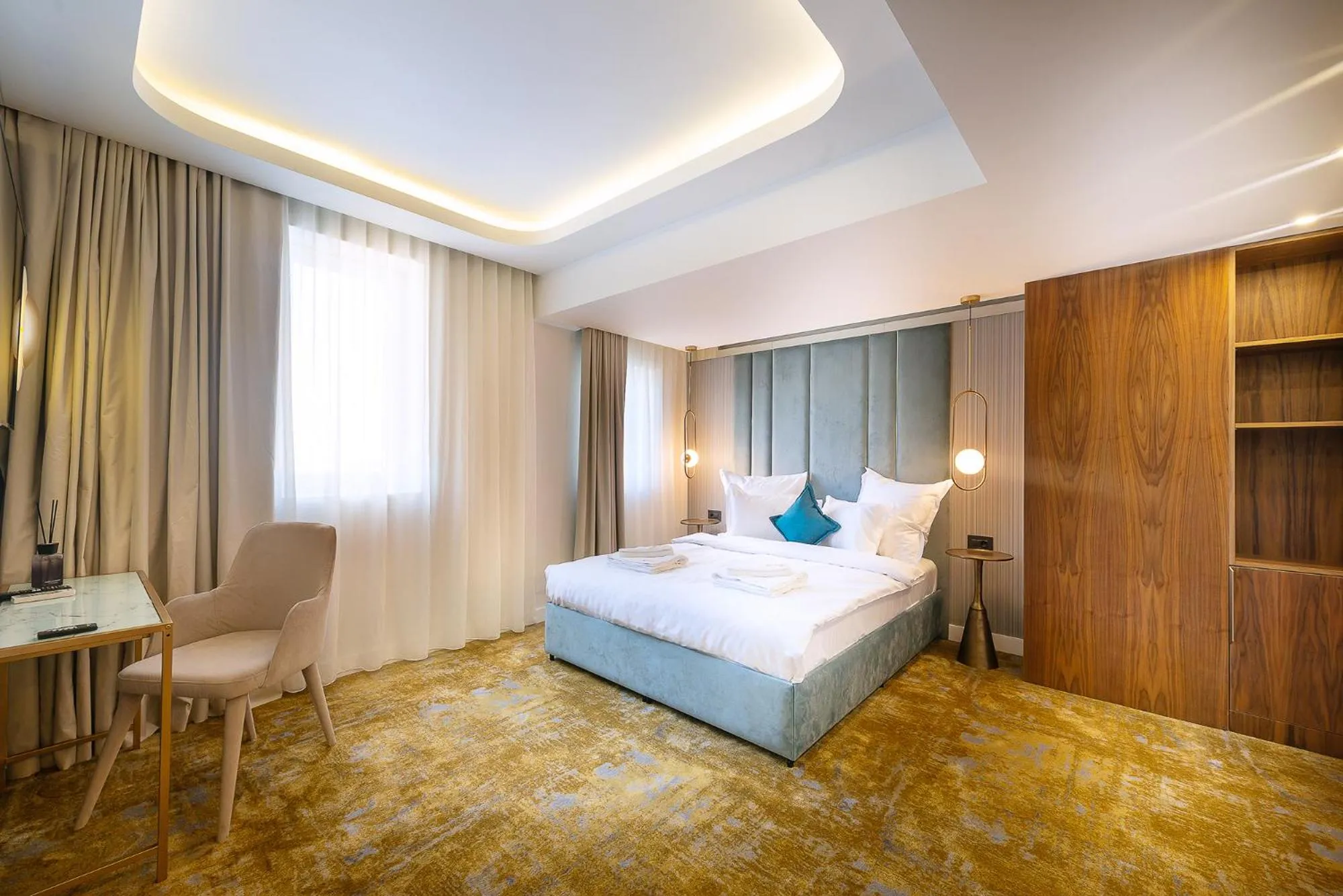 Bed in Yasu Luxury Rooms