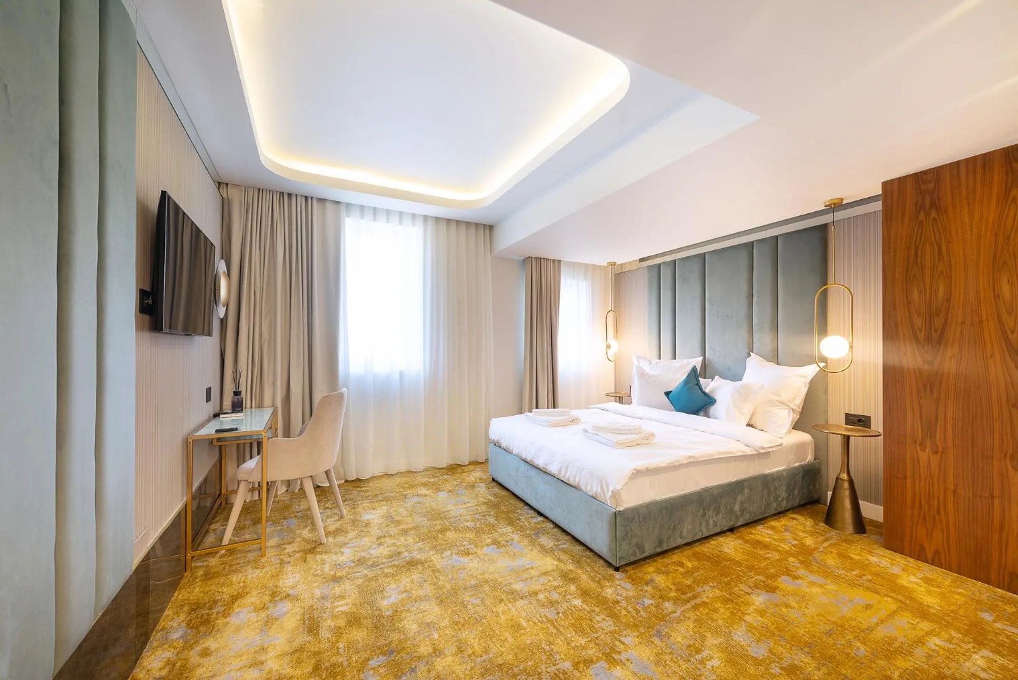 Bed in Yasu Luxury Rooms