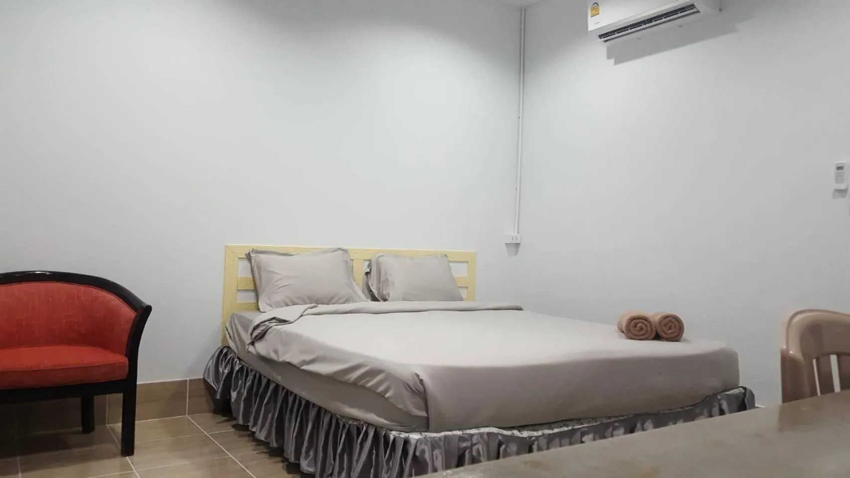 Bed in Lovely Paradise Phangan Hotel