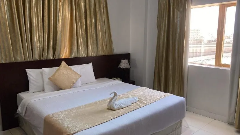 Bed in SADARA HOTELS APARTMENTS