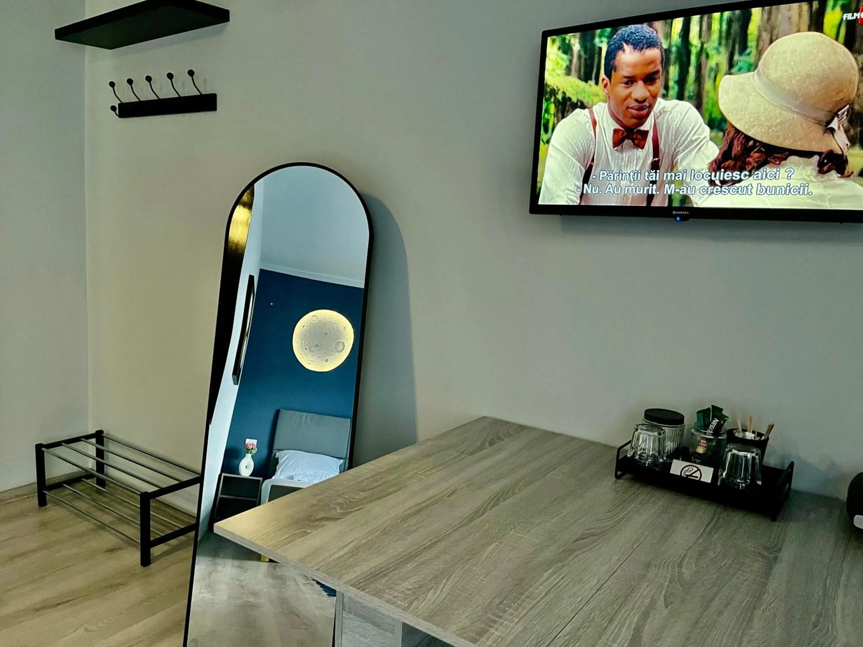 TV and multimedia in Cozy Hideout - Condo Hotel