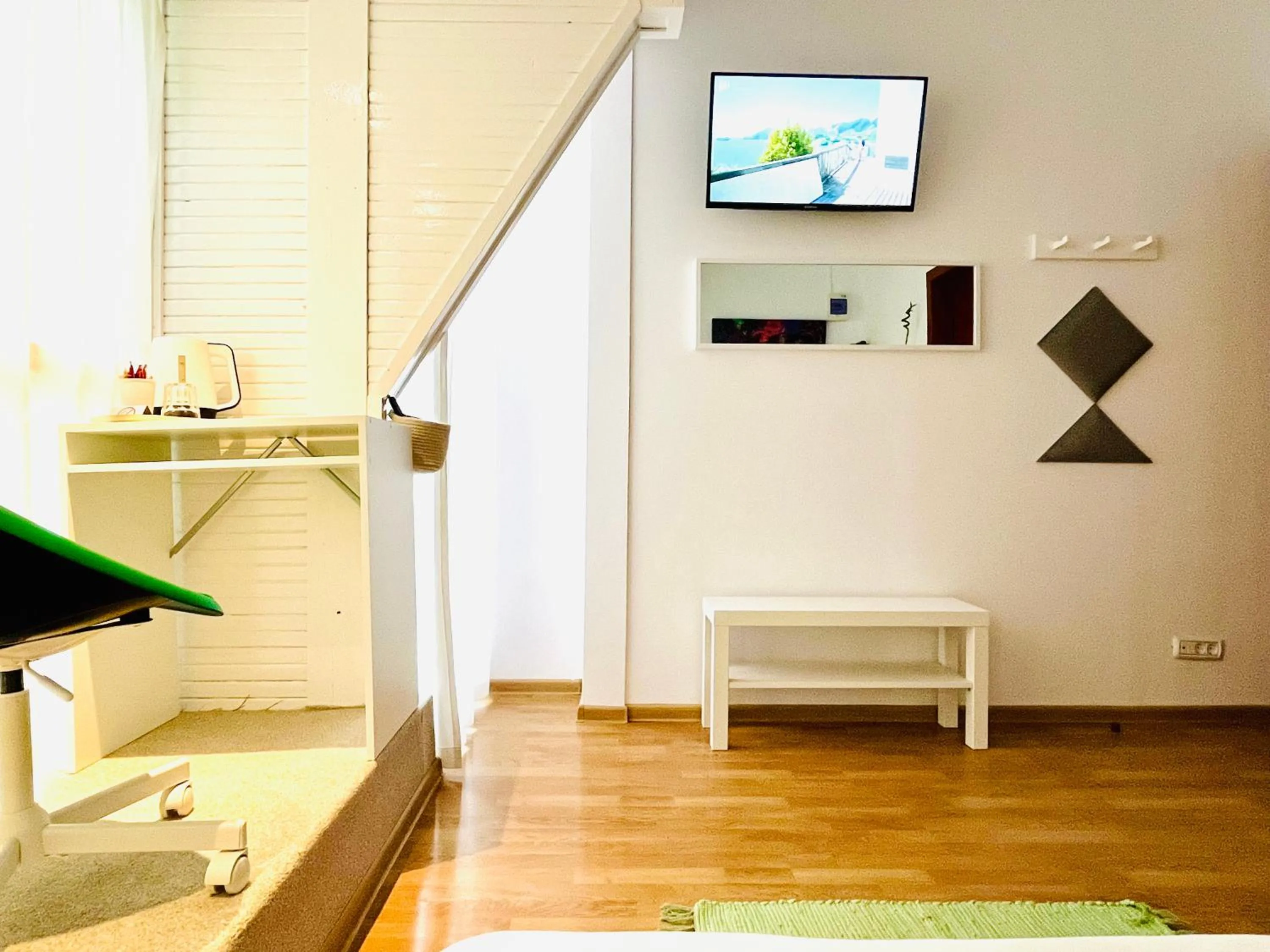 TV and multimedia in Cozy Hideout - Condo Hotel