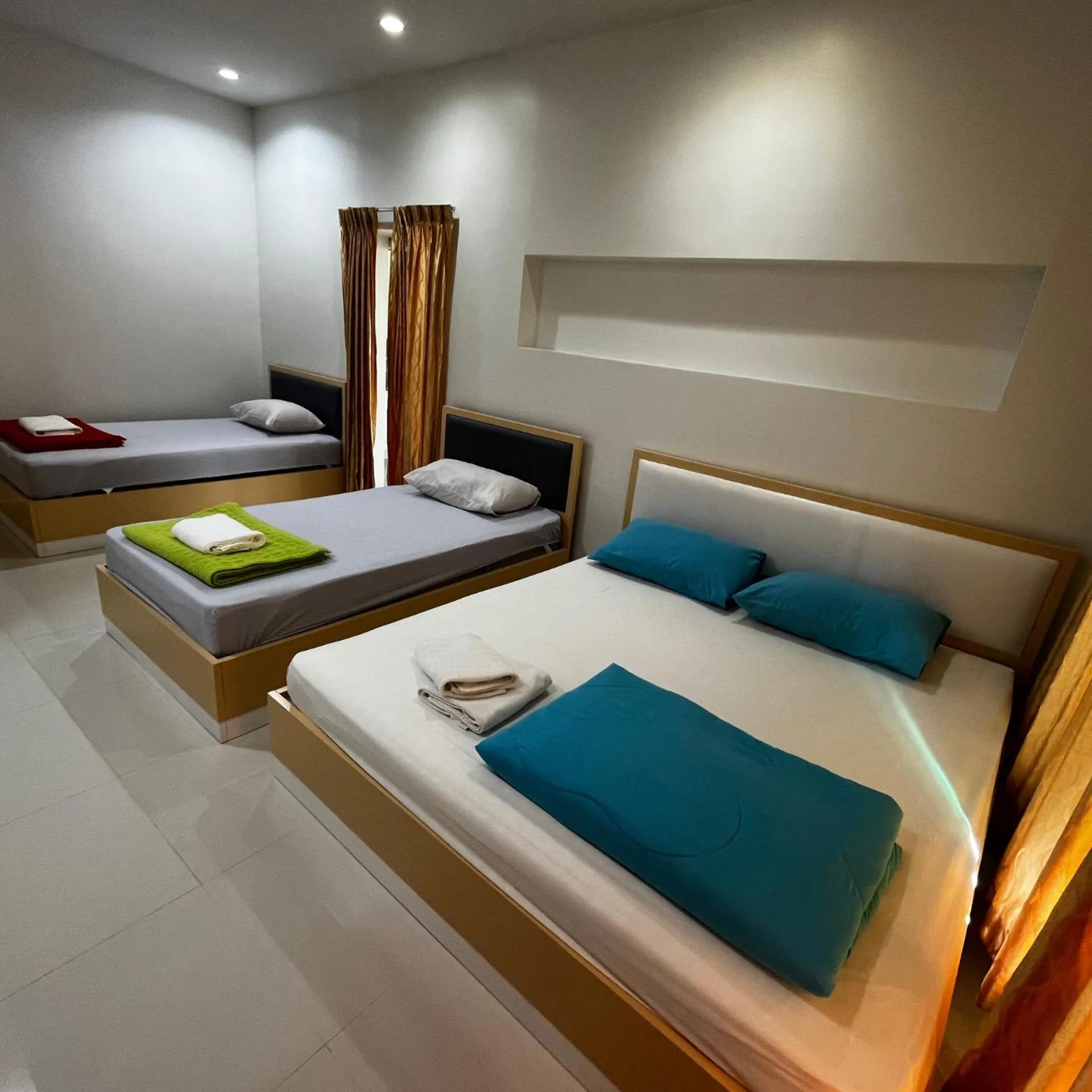Bed in บ้านพักสิริ มุกดาหาร (Baan Siri Mukdahan)