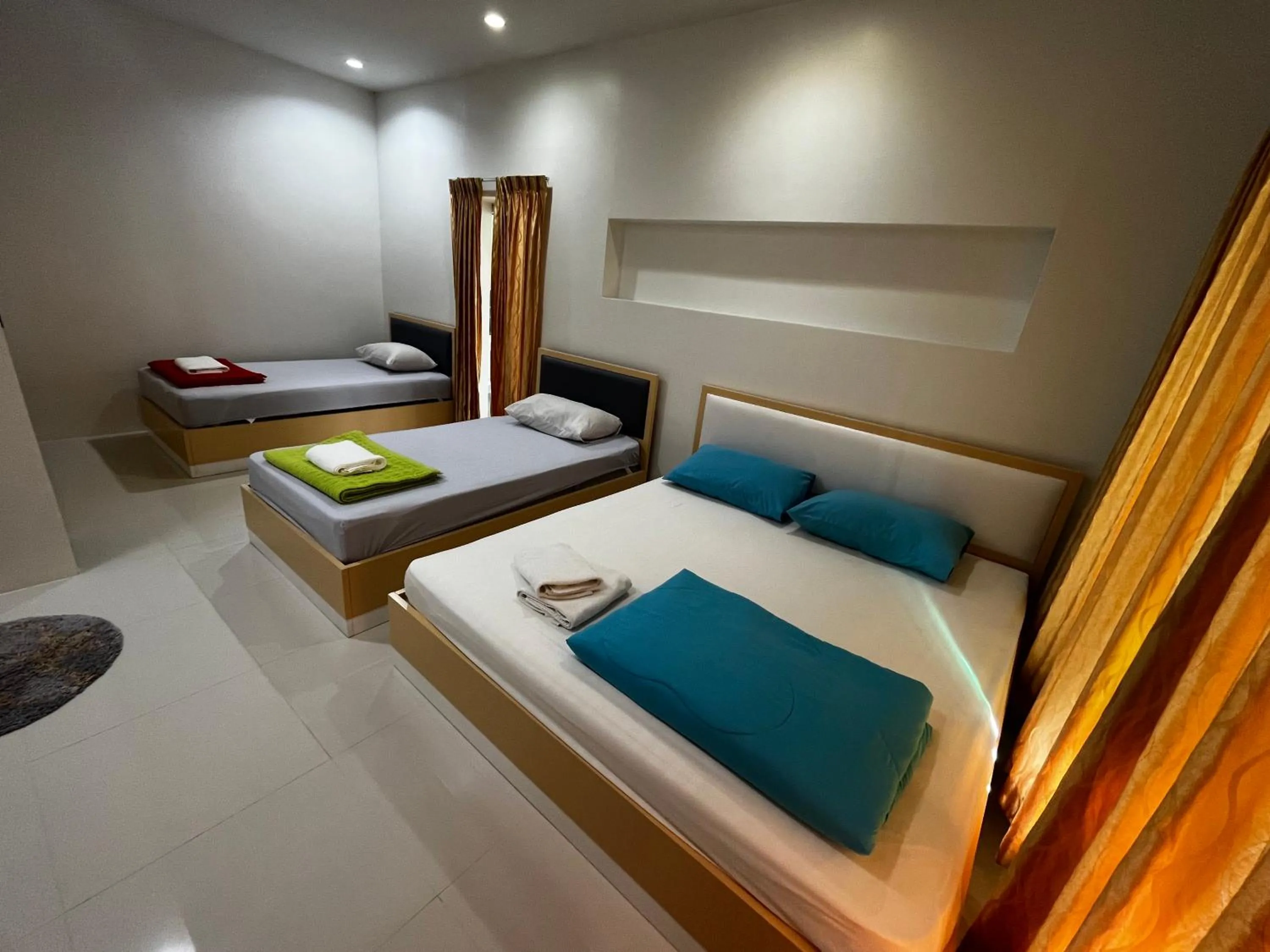 Bedroom, Bed in บ้านพักสิริ มุกดาหาร (Baan Siri Mukdahan)