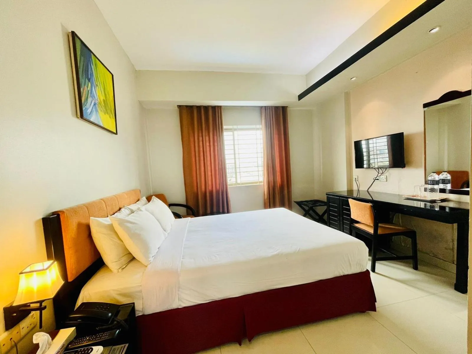 Bed in Orchid Business Hotel