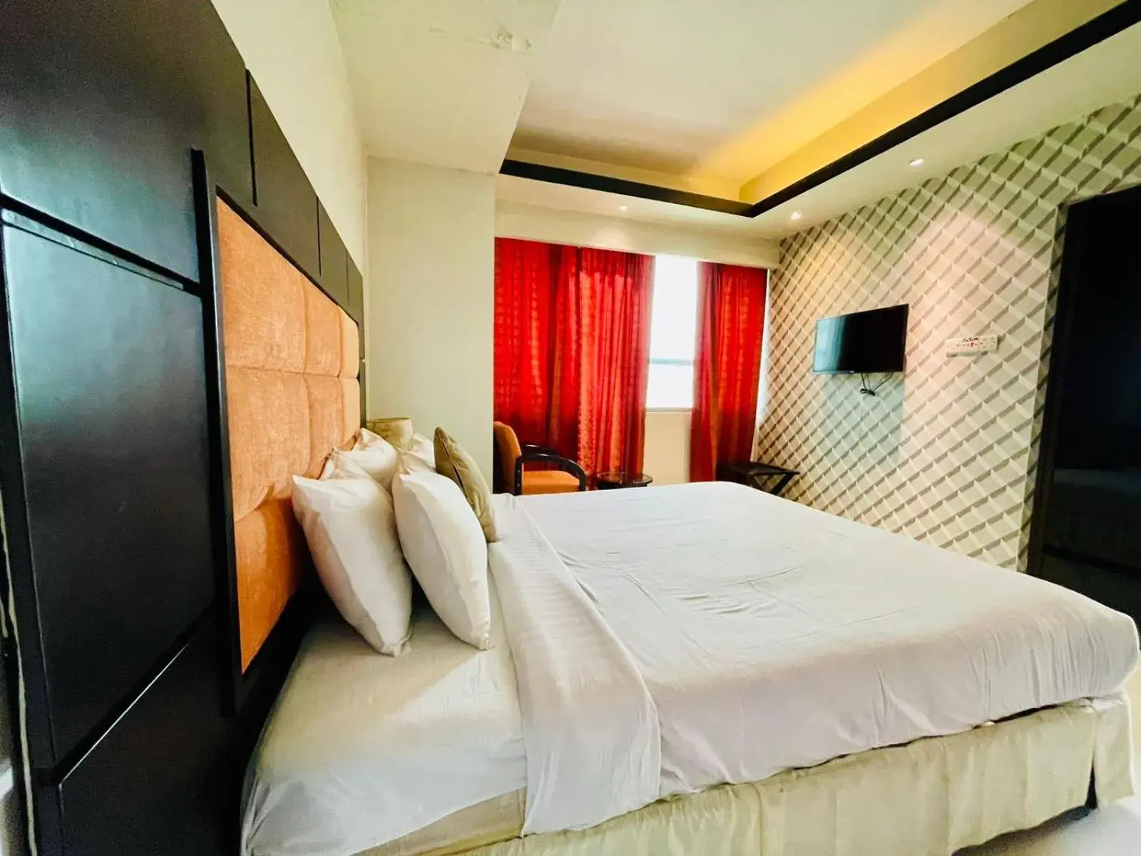 Bed in Orchid Business Hotel Bed in Orchid Business Hotel