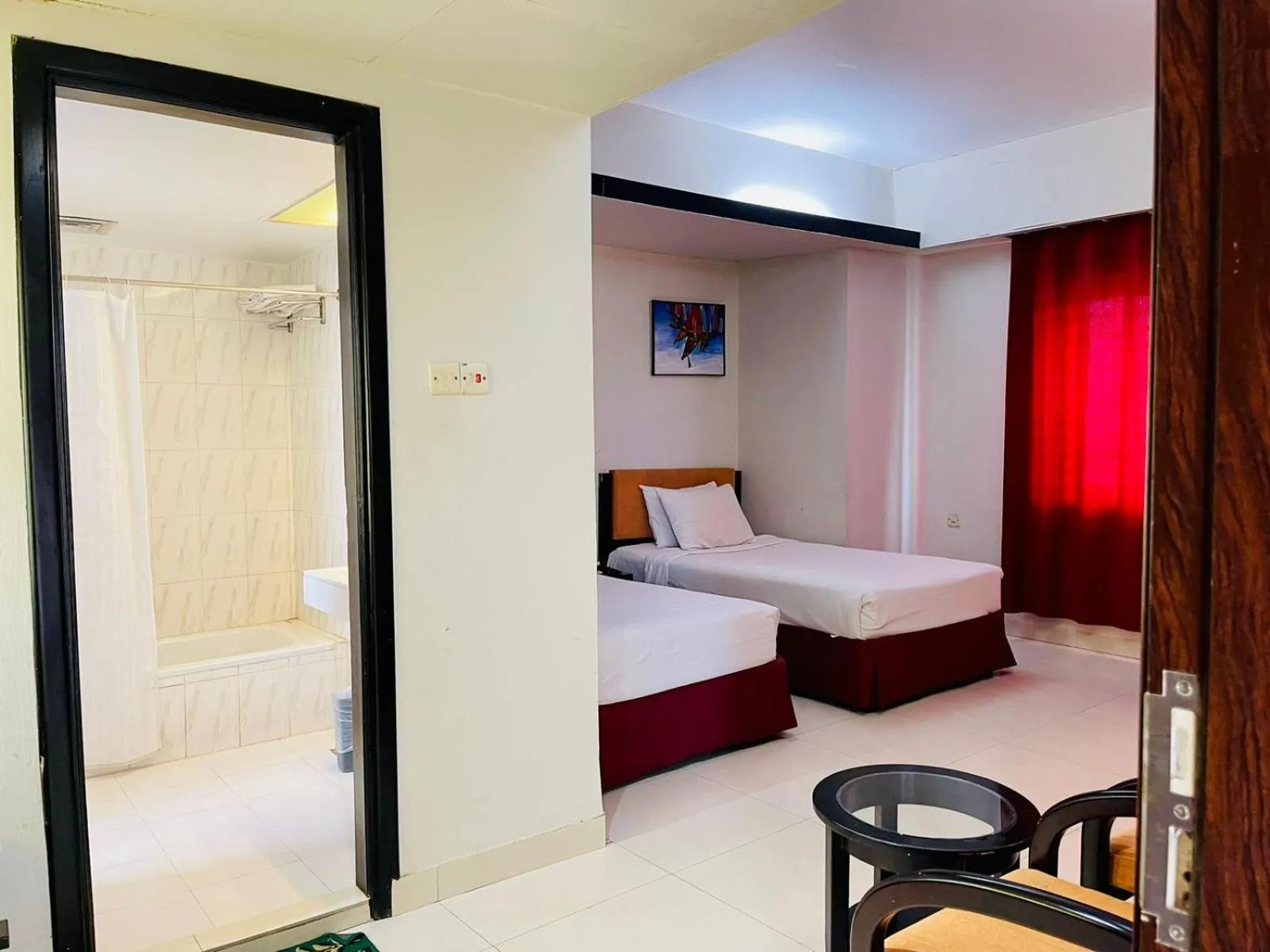 Bed in Orchid Business Hotel