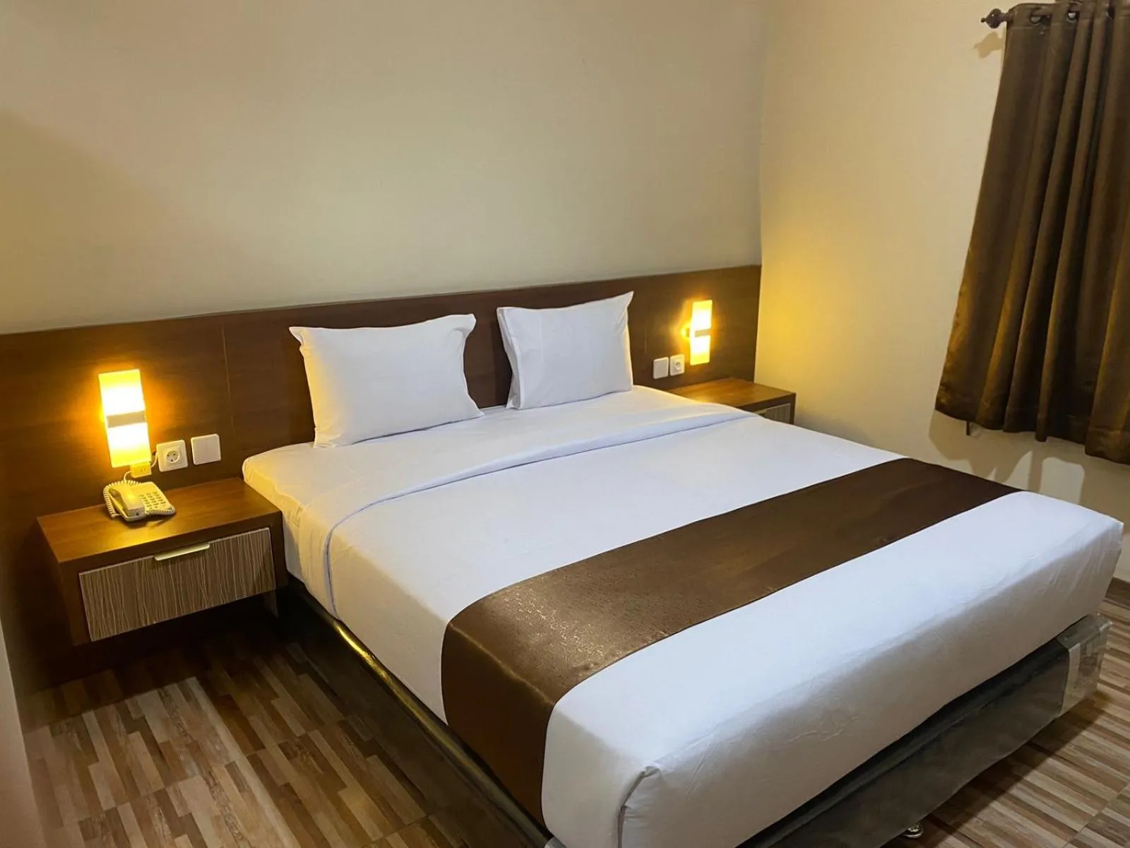 Bed in T HOTEL KUALANAMU