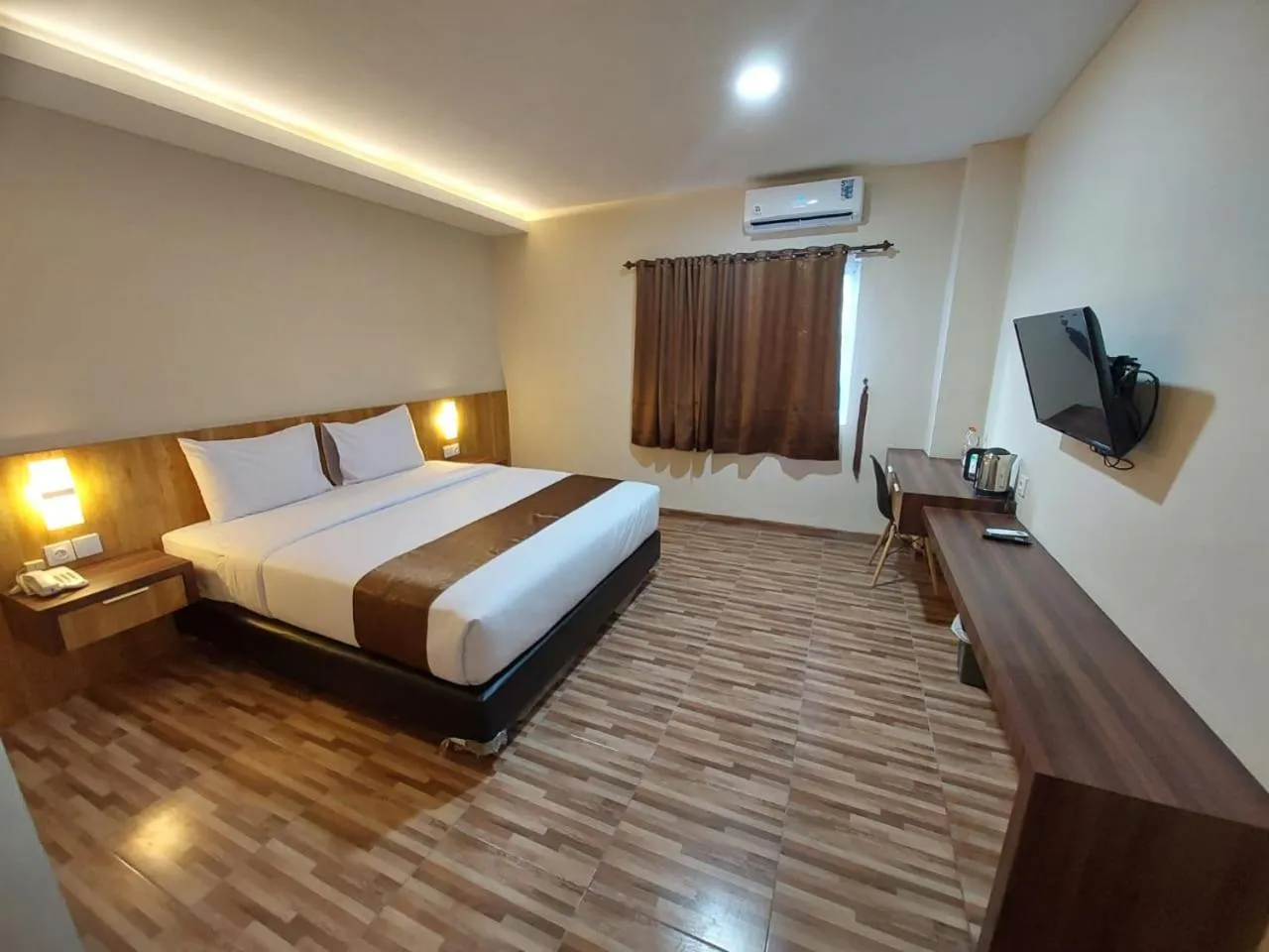 Bed in T HOTEL KUALANAMU