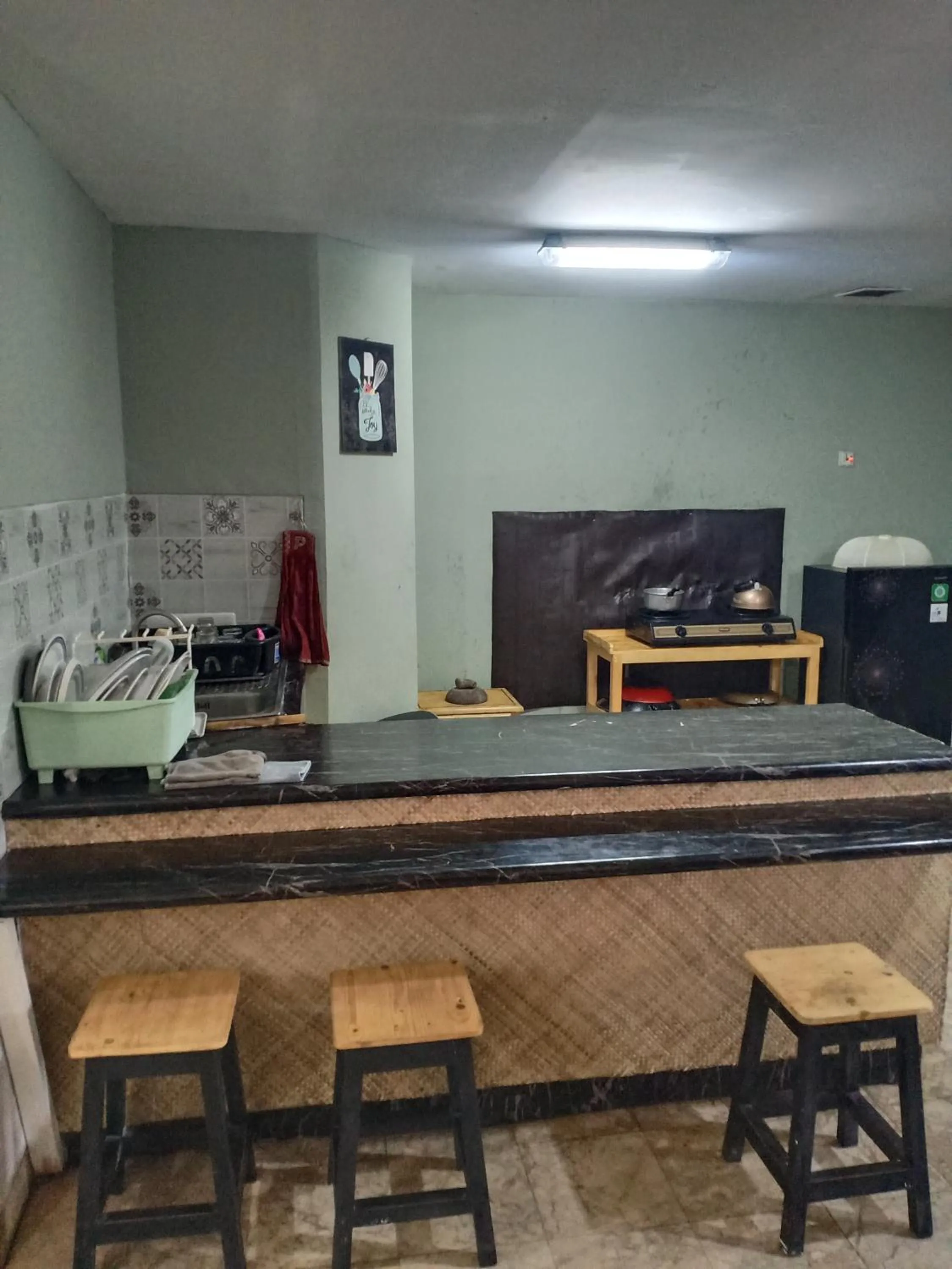 Kitchen or kitchenette in Kondominium Pantai Carita