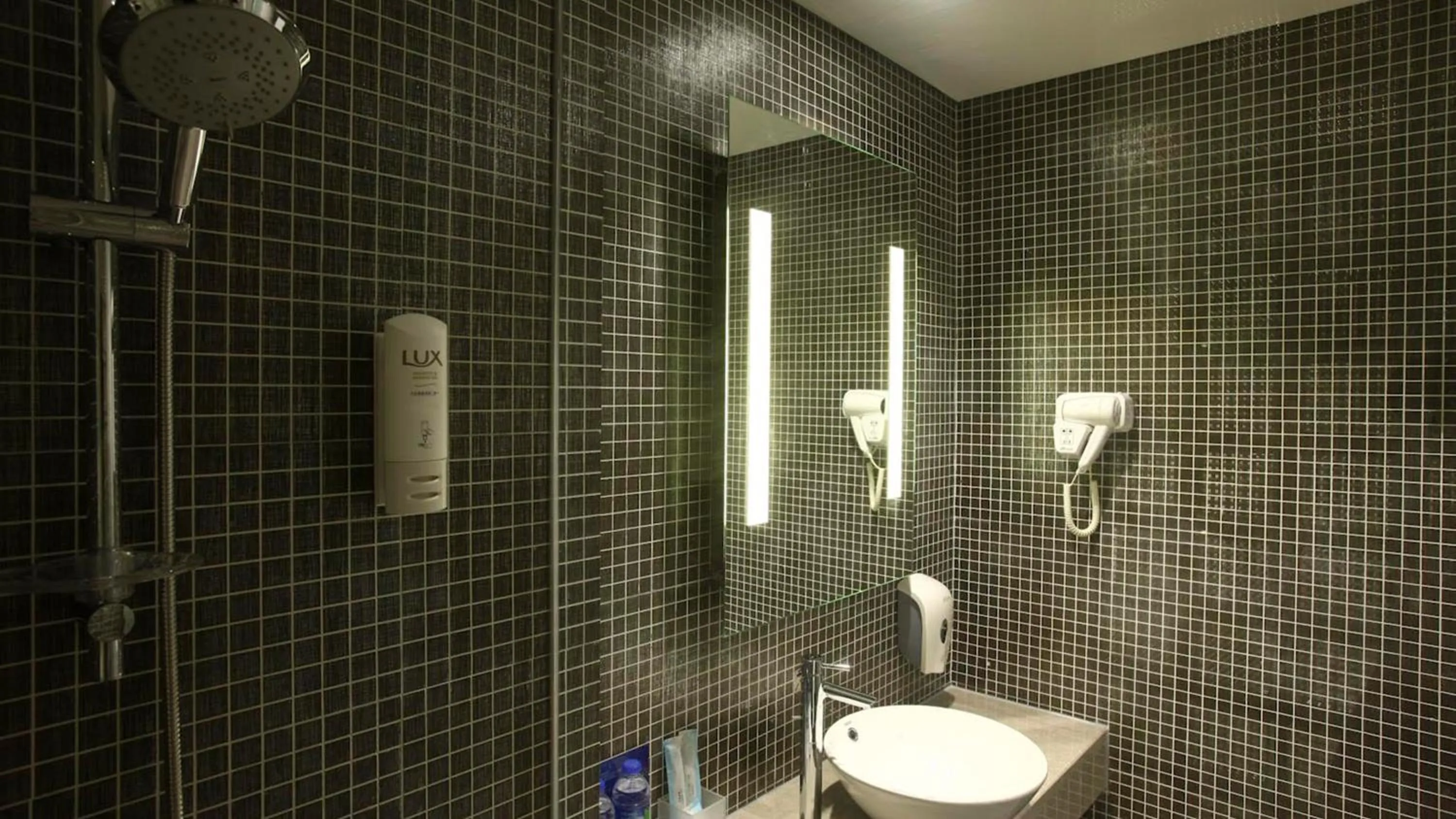 Shower in Holiday Inn Express Shanghai Gongkang by IHG