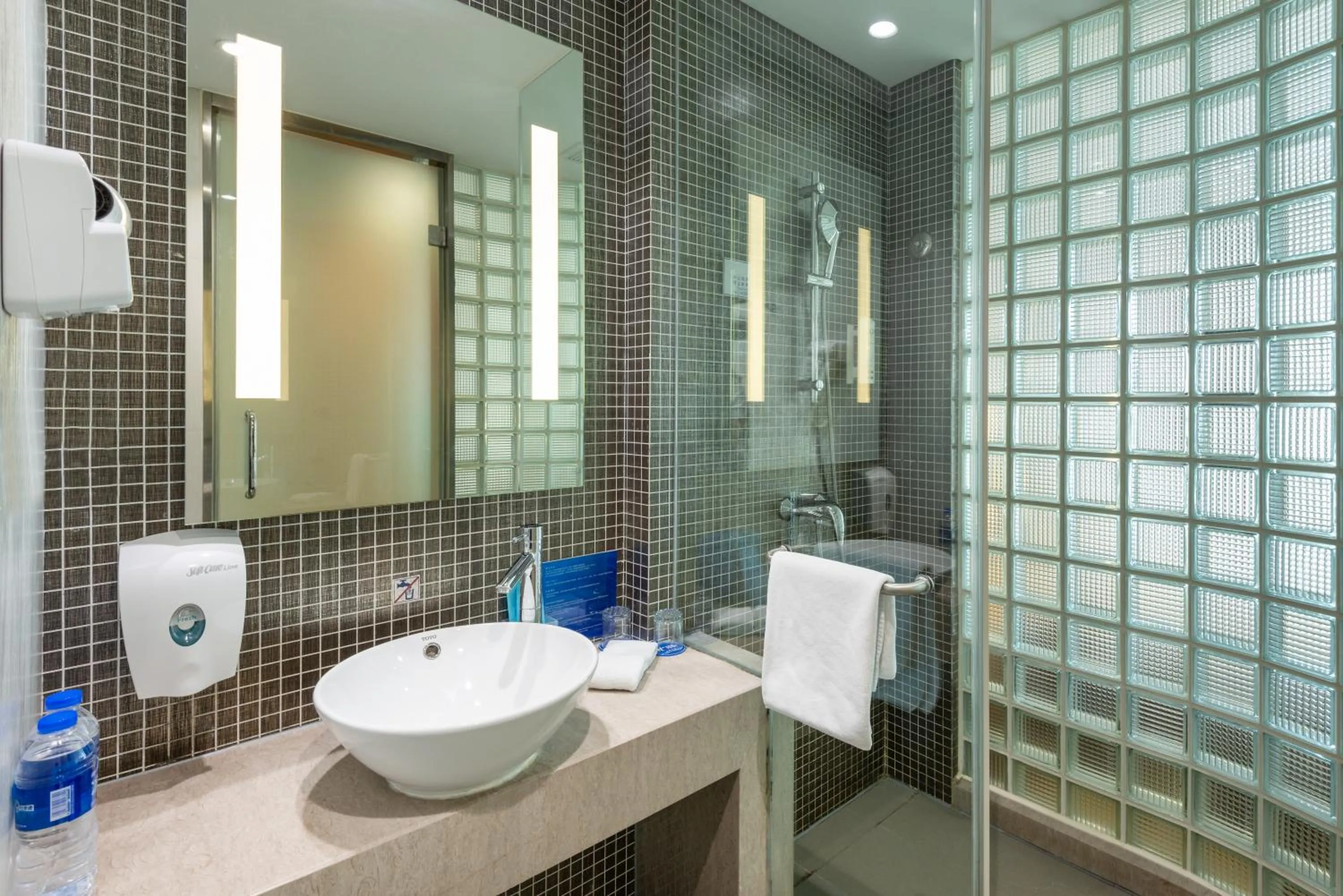 Toilet in Holiday Inn Express Shanghai Gongkang by IHG