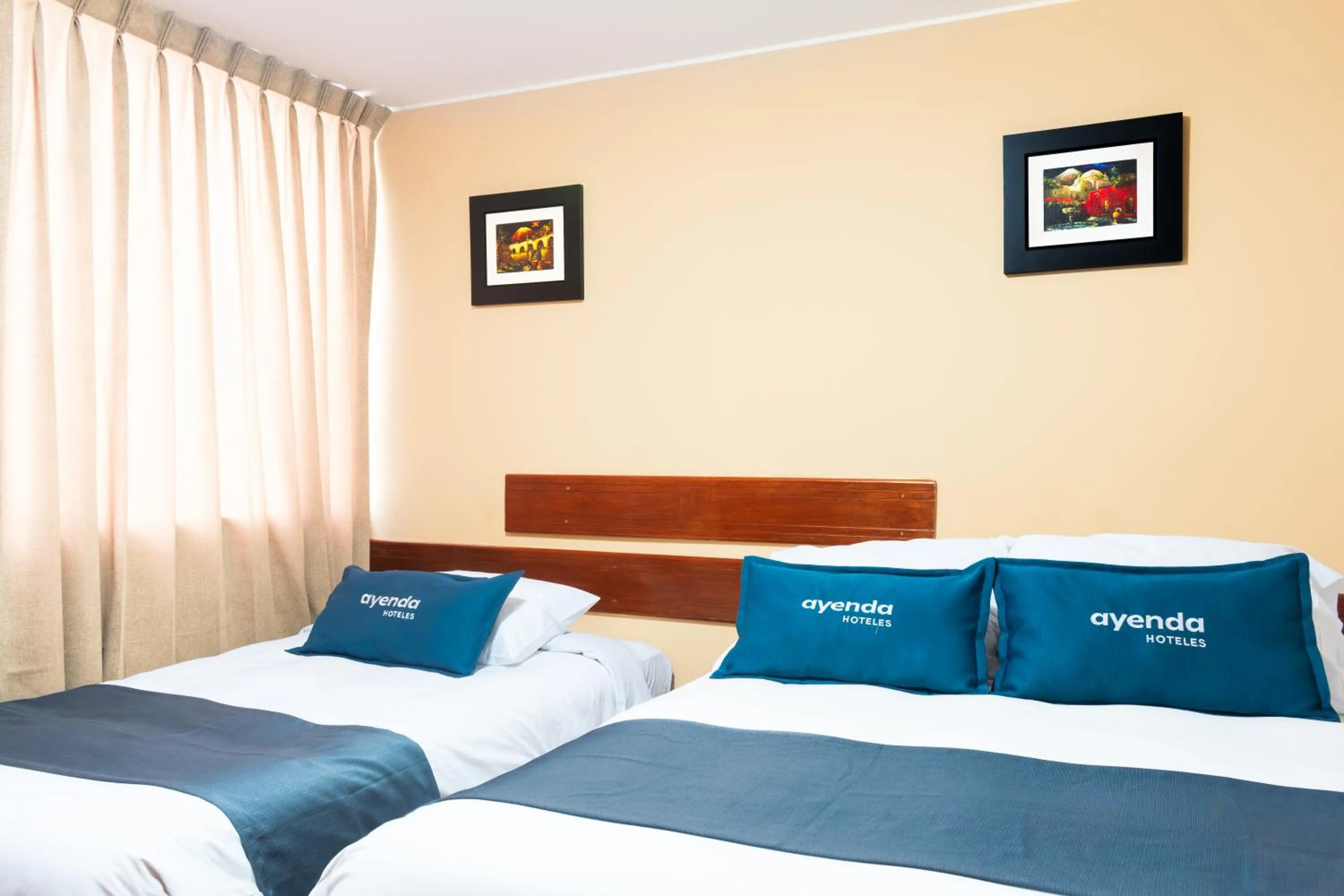 Bed in El puente Hotel Boutique