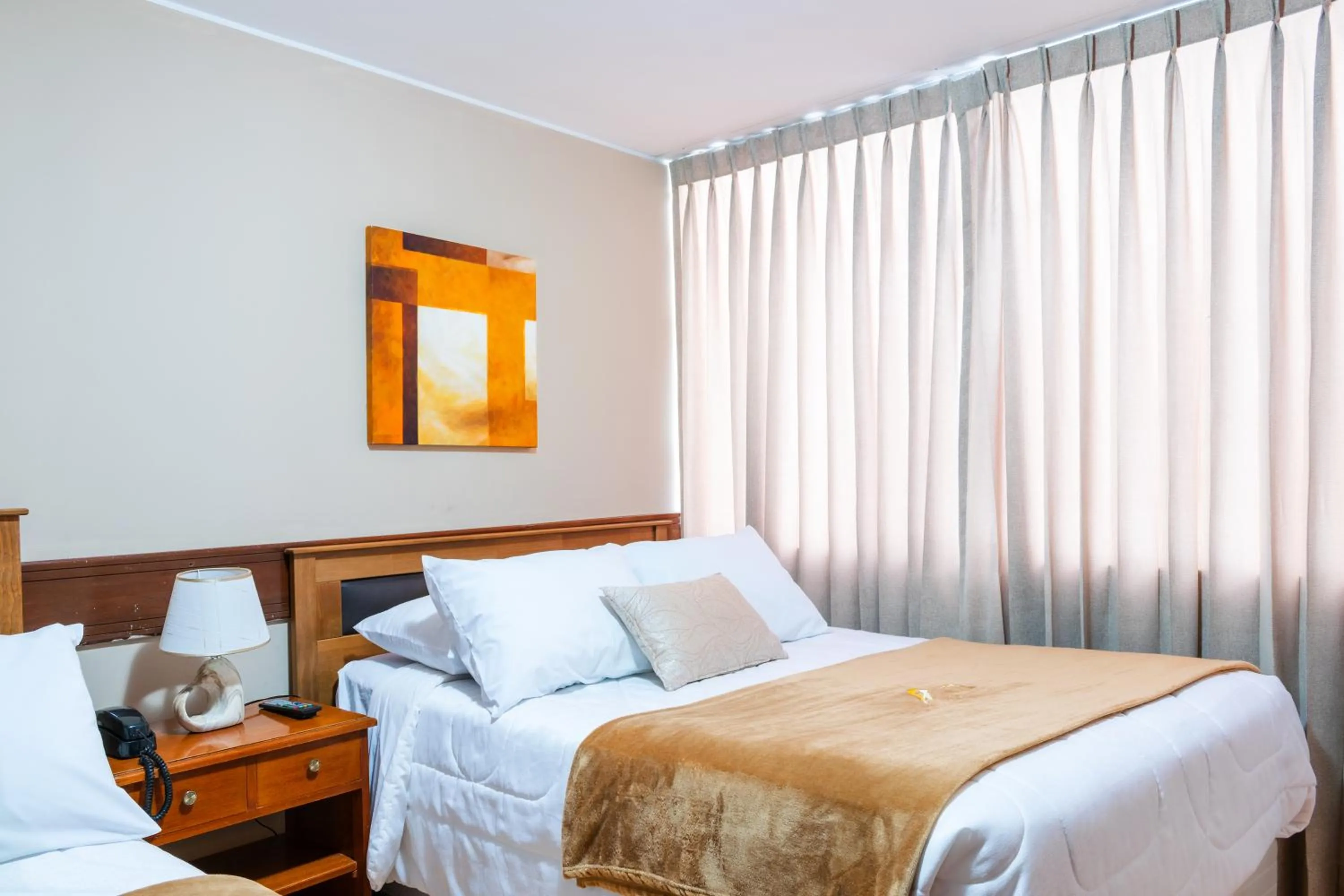 Bed in El puente Hotel Boutique