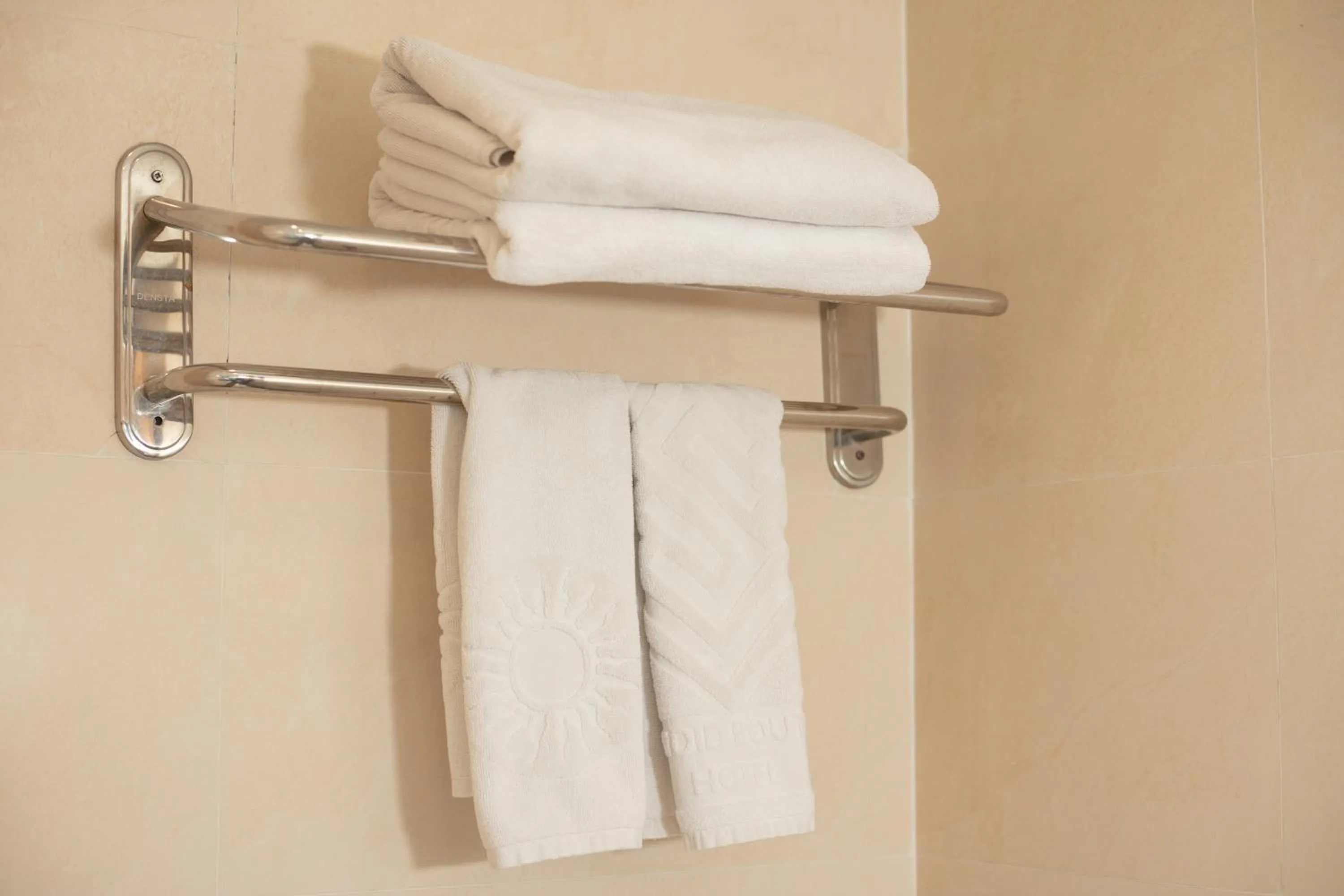 towels in Golden Sunshine Villa Hotel and Travel