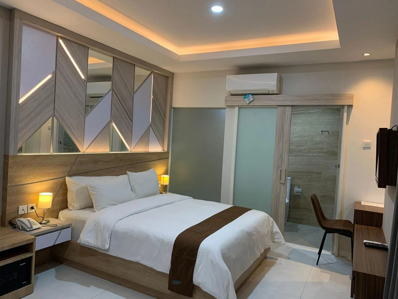 Bed in Sinergi Hotel & Villa