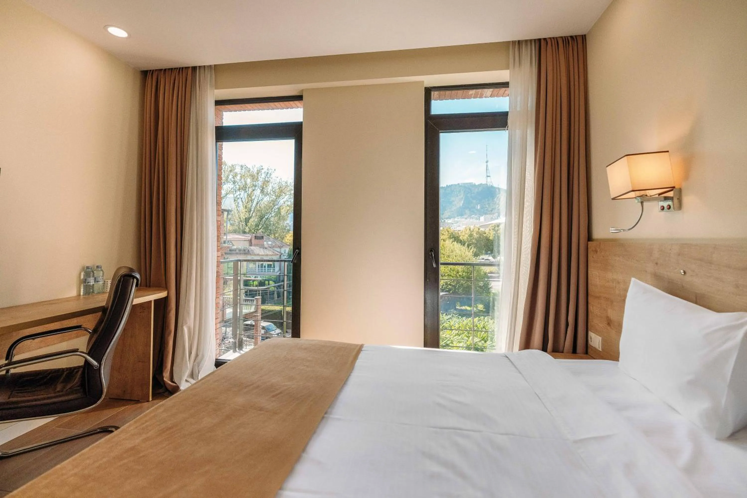 Bed in Atrium Boutique Hotel