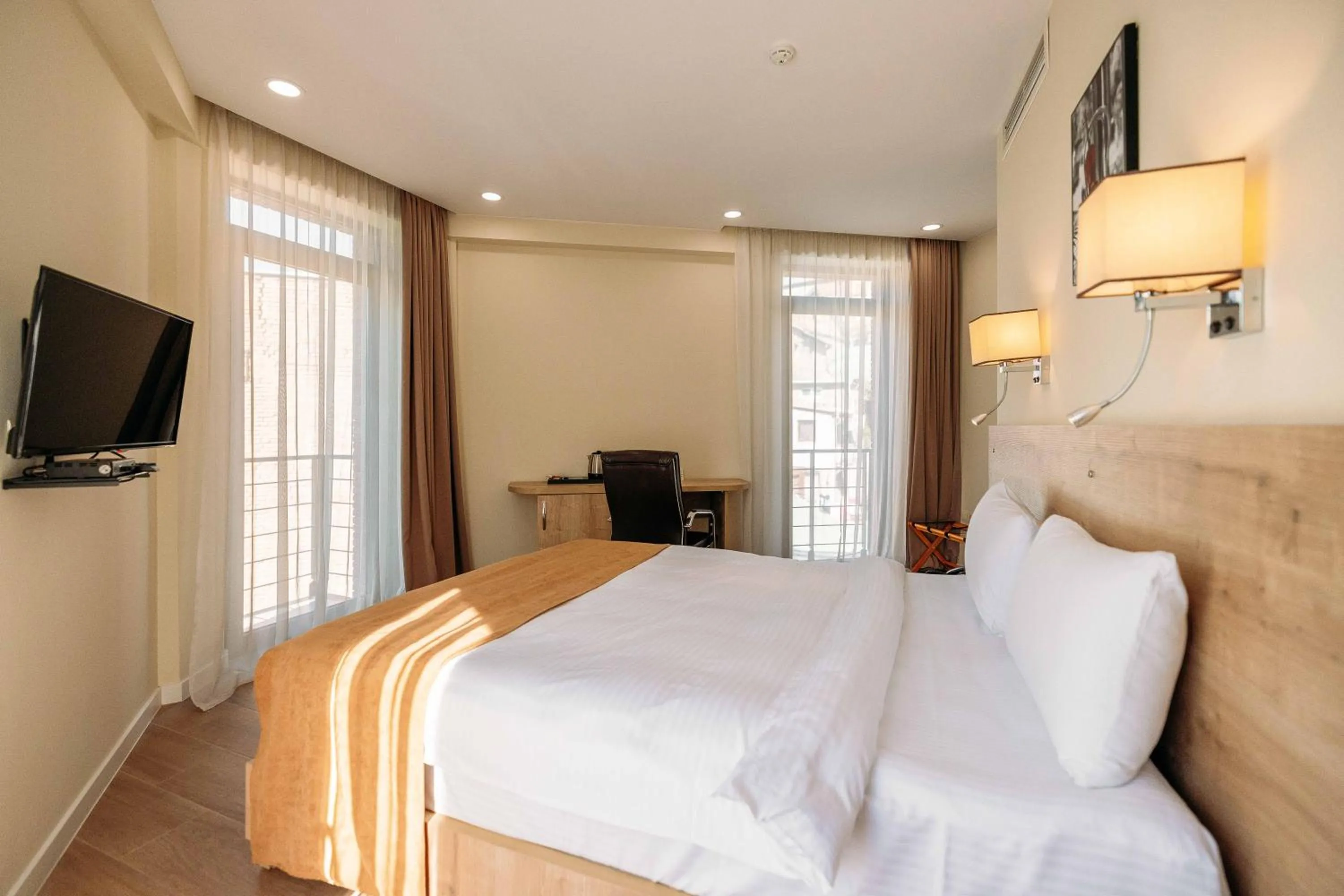 Bed in Atrium Boutique Hotel