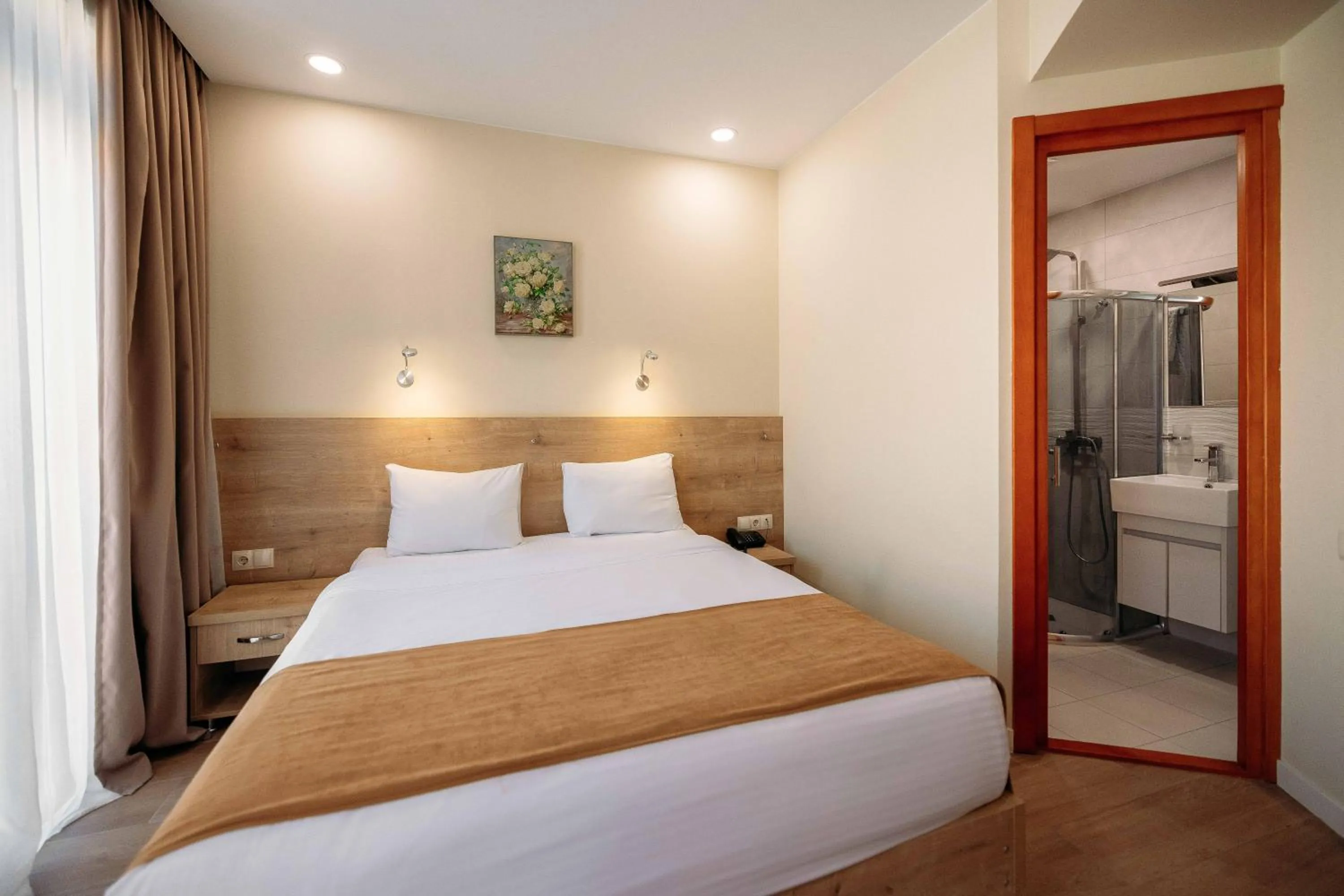 Bed in Atrium Boutique Hotel