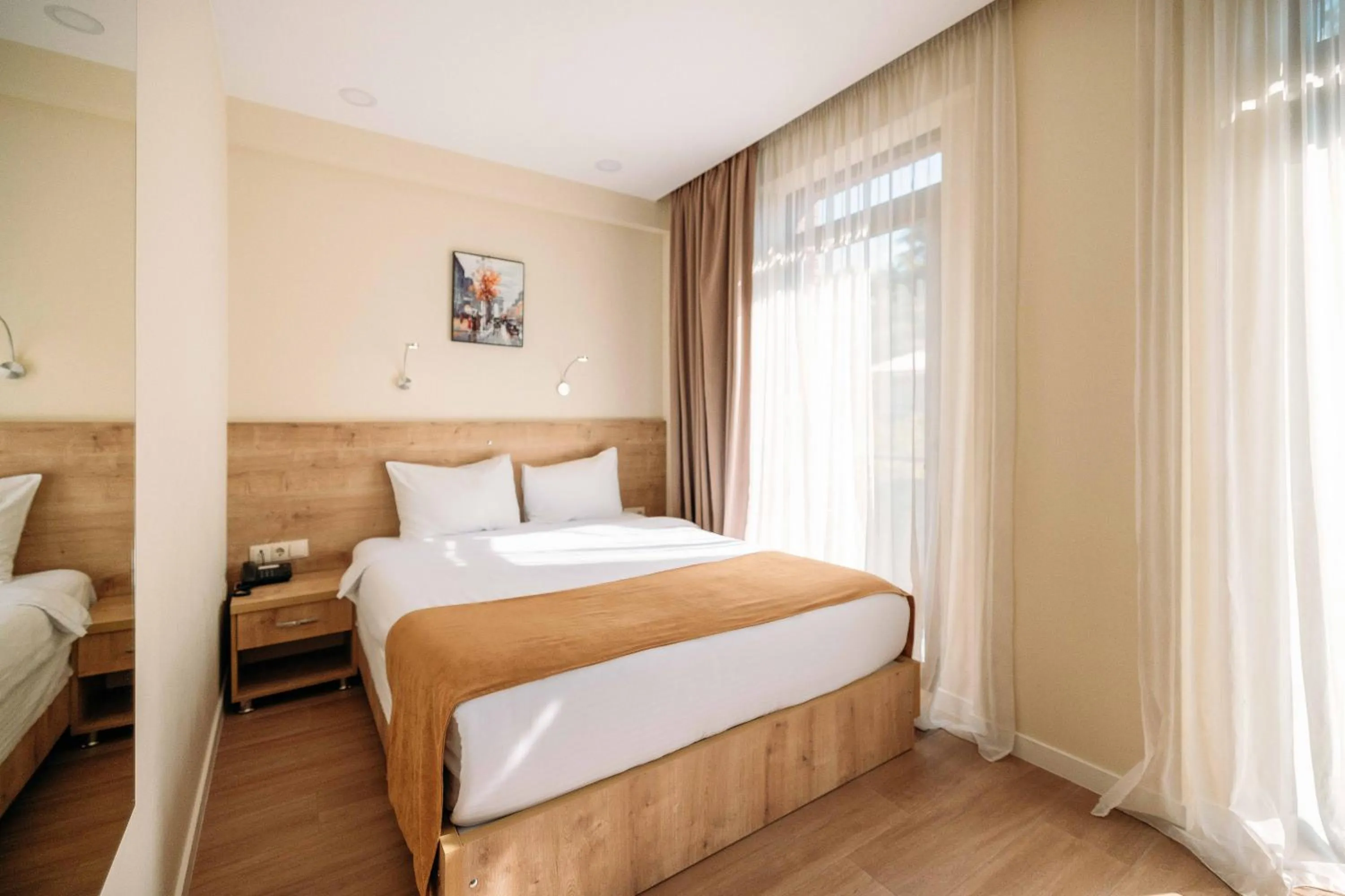 Bed in Atrium Boutique Hotel