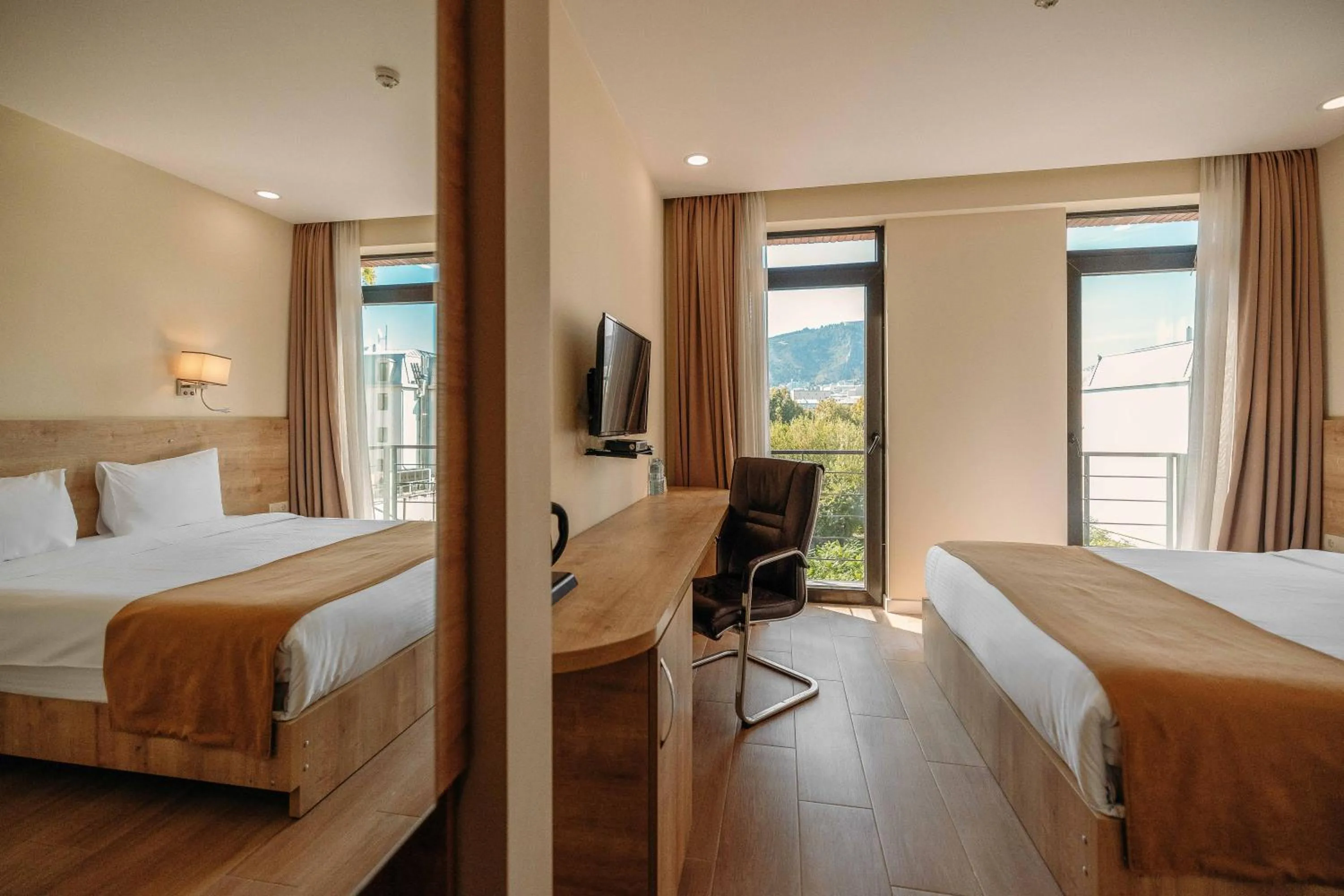 Bed in Atrium Boutique Hotel