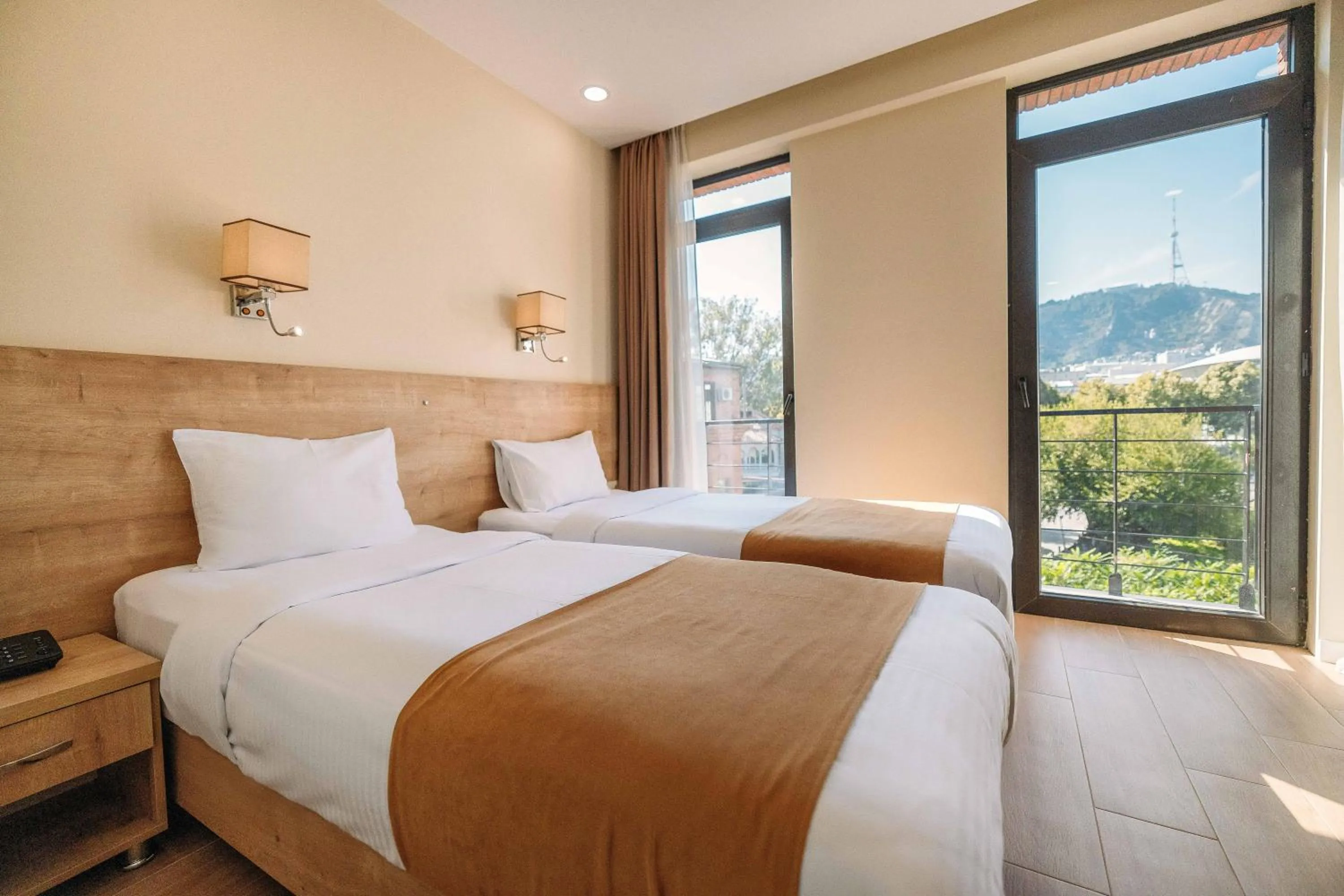 Bed in Atrium Boutique Hotel