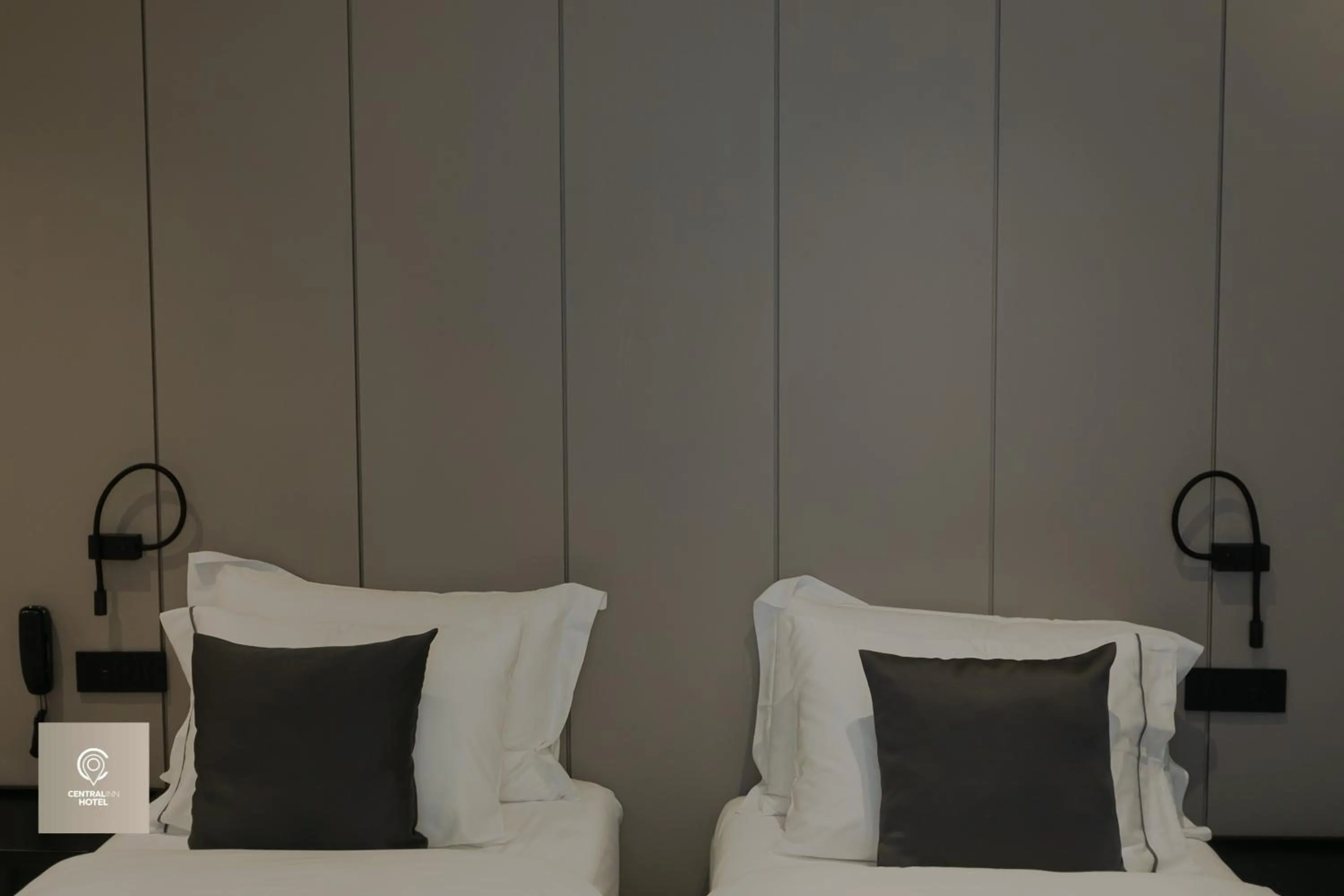 Bed in Central Inn Hotel