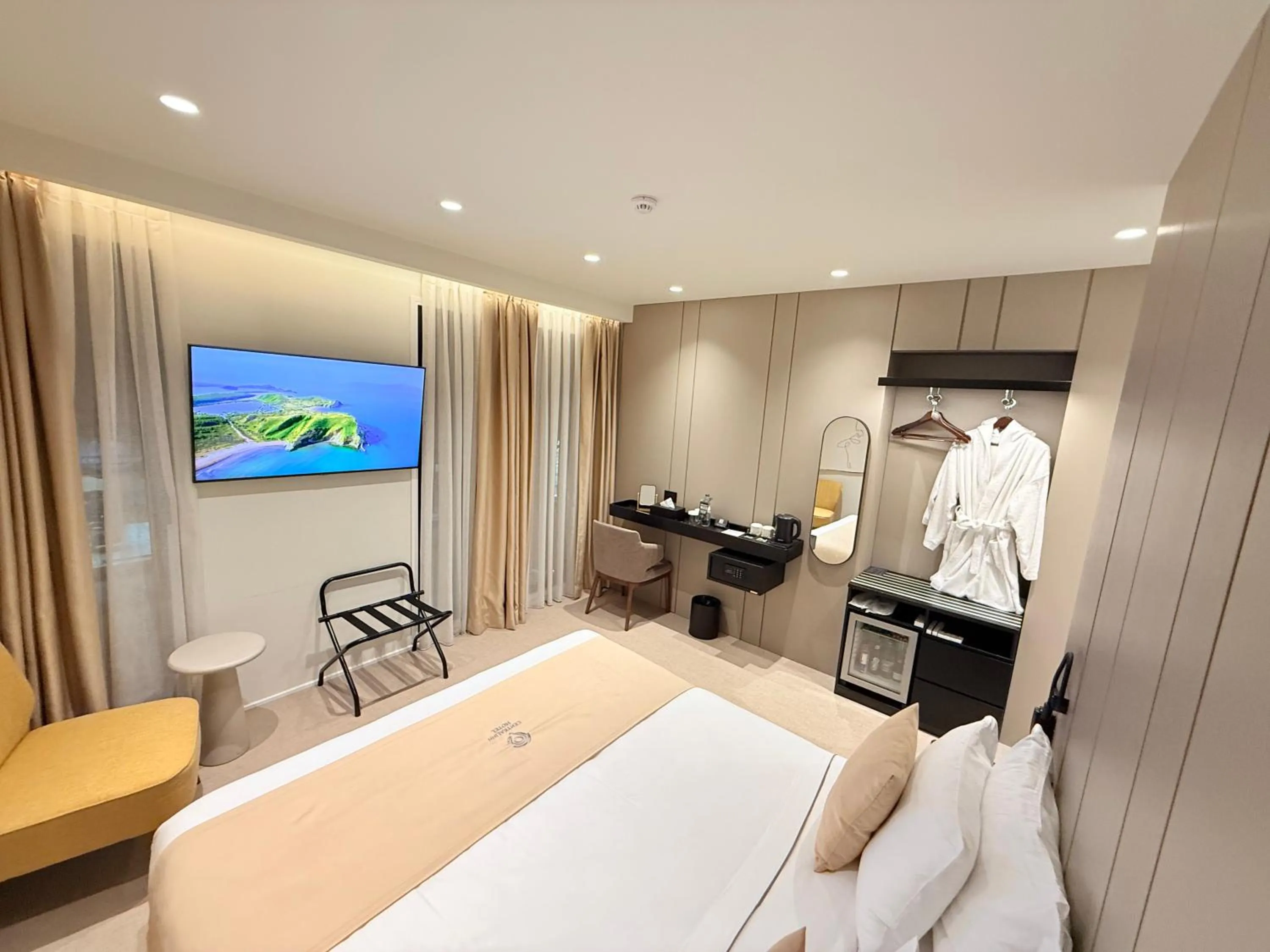 Bed in Central Inn Hotel