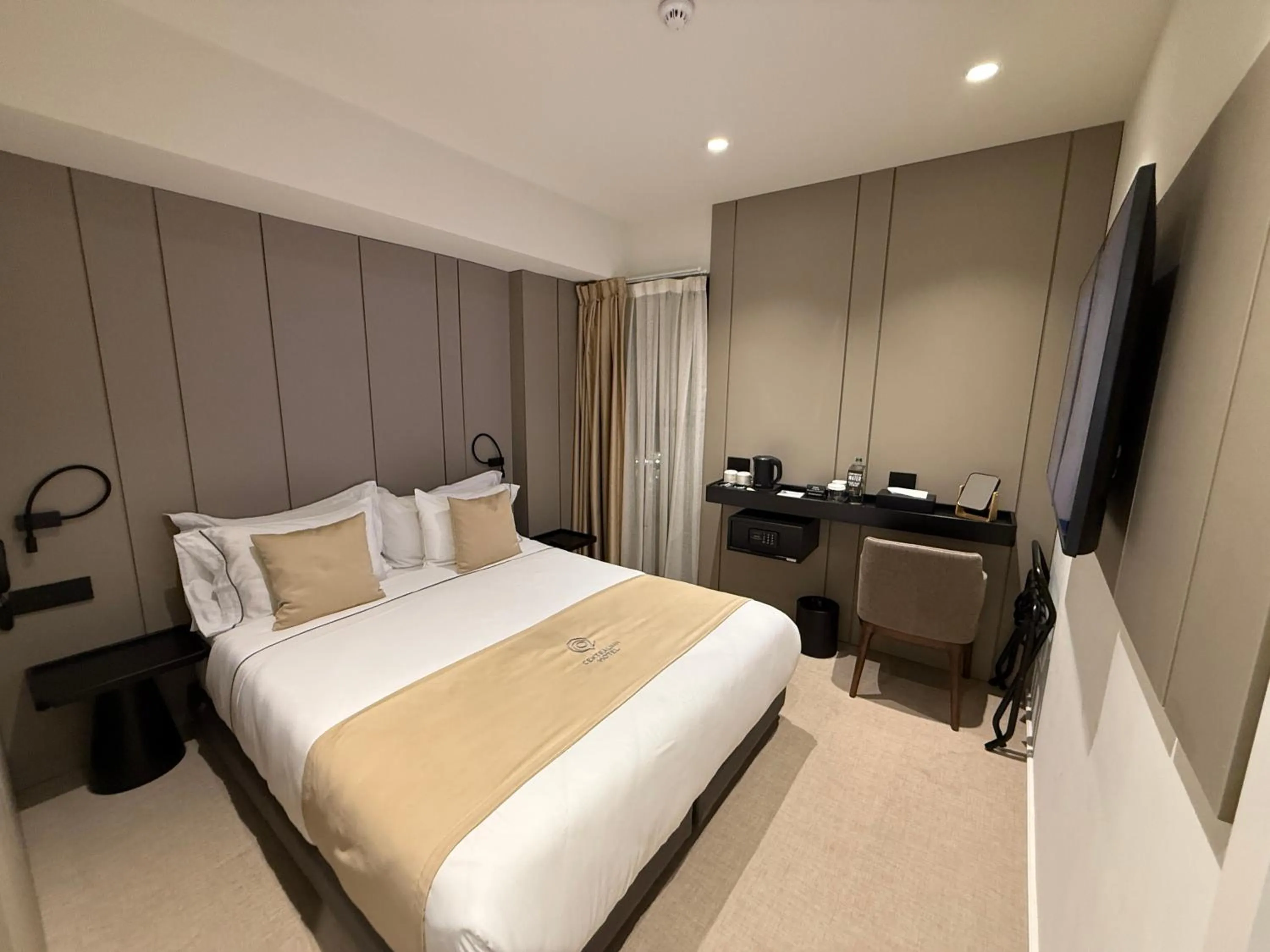 Bed in Central Inn Hotel