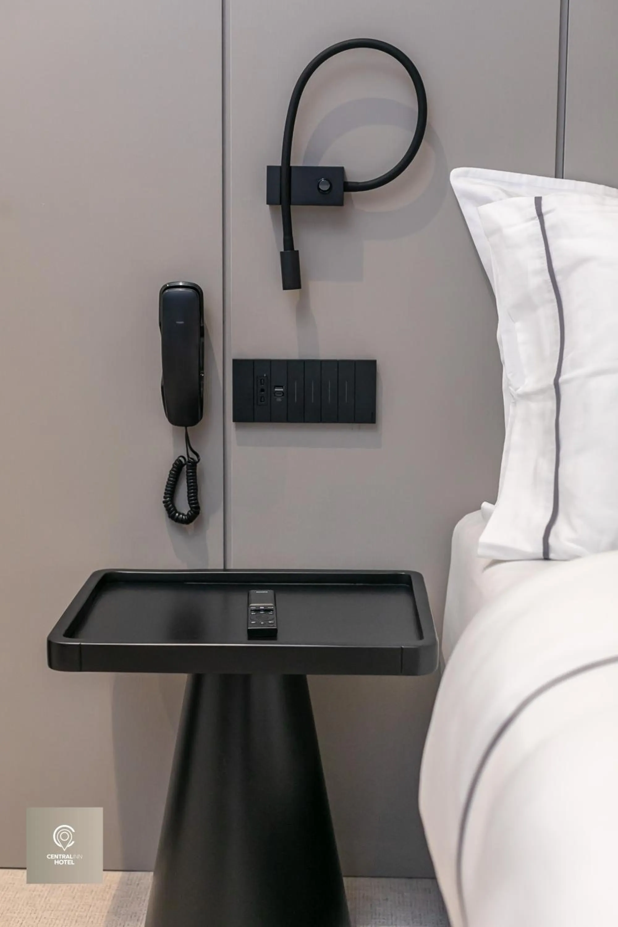 Bed in Central Inn Hotel