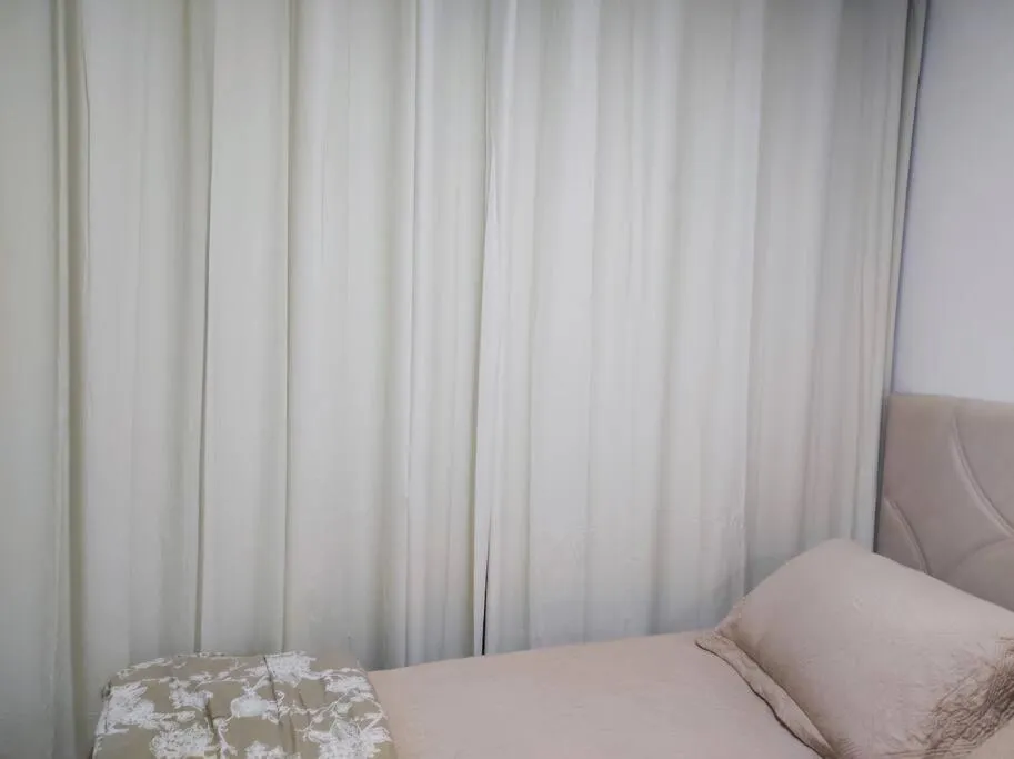 Bed in Fabuloso Apartamento central em Curitiba