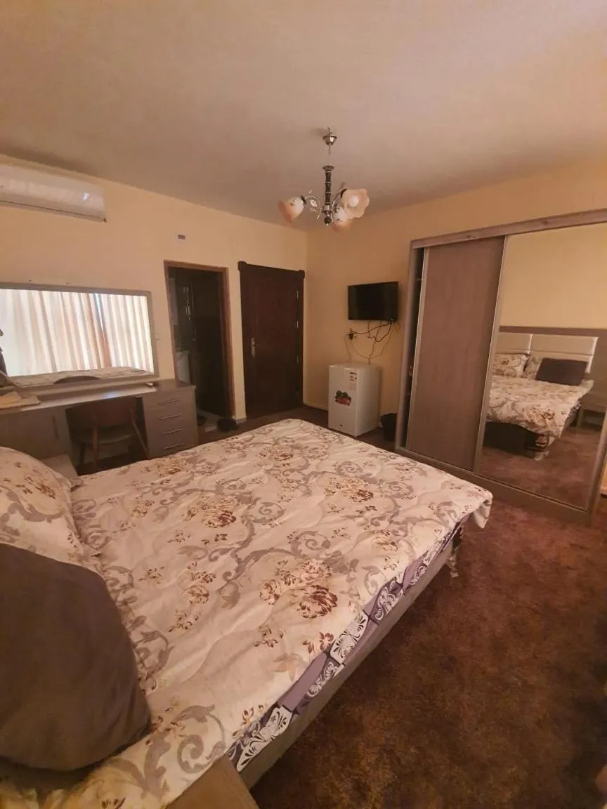 Bed in Alfares Hotel