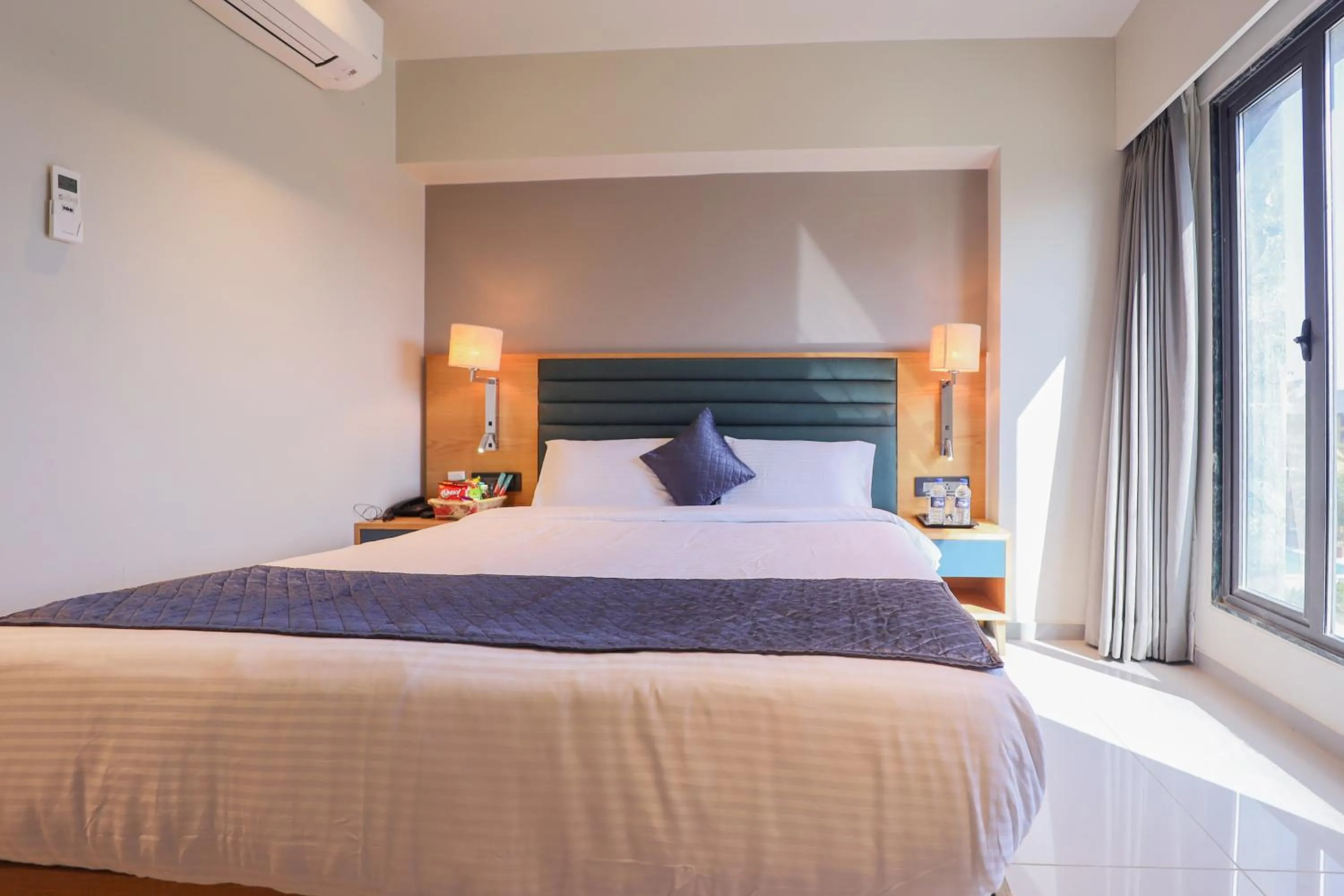 Bed in Pride Resort Ambaji