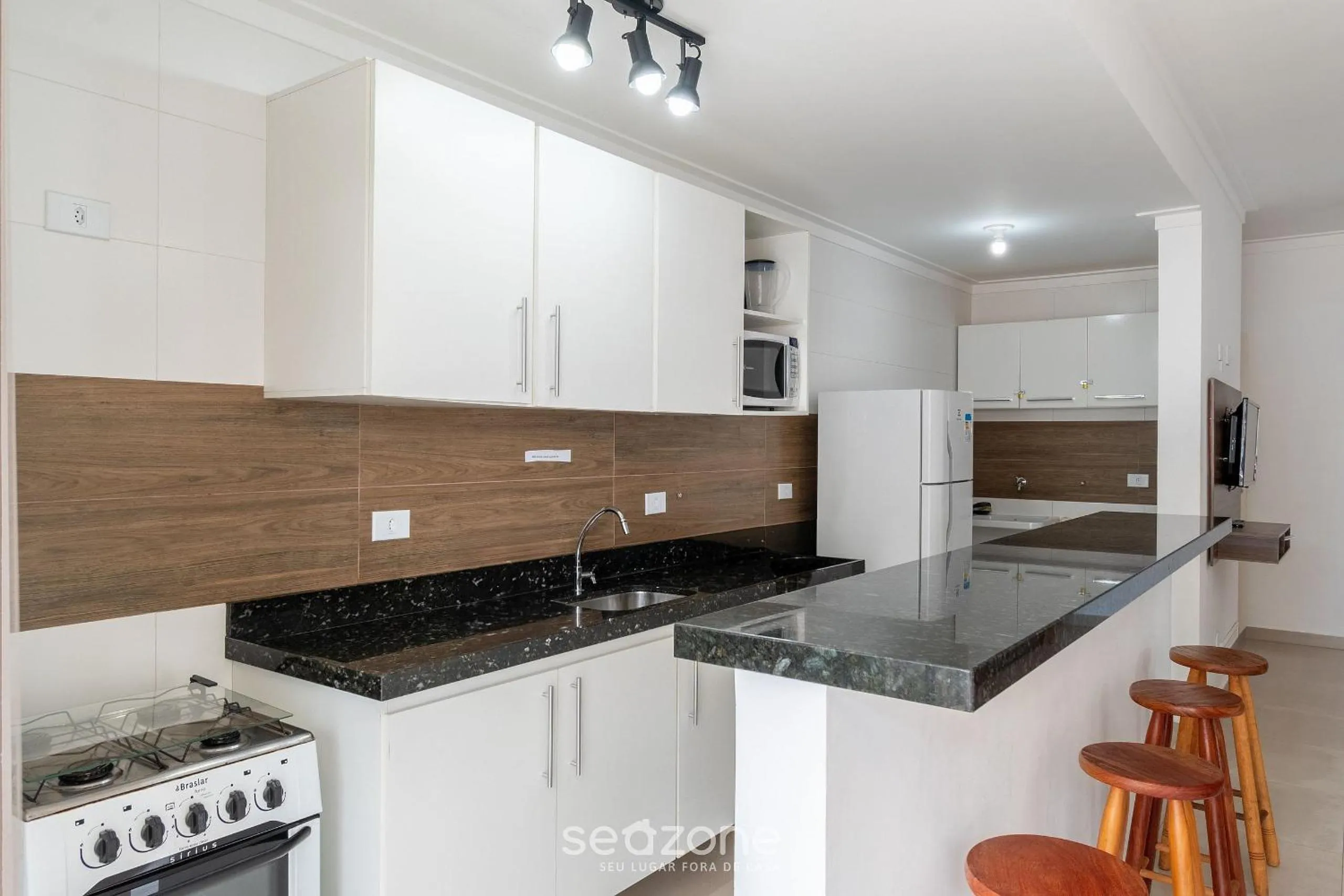 Kitchen or kitchenette in RJI - Apartamentos próximos da praia de Itaguá