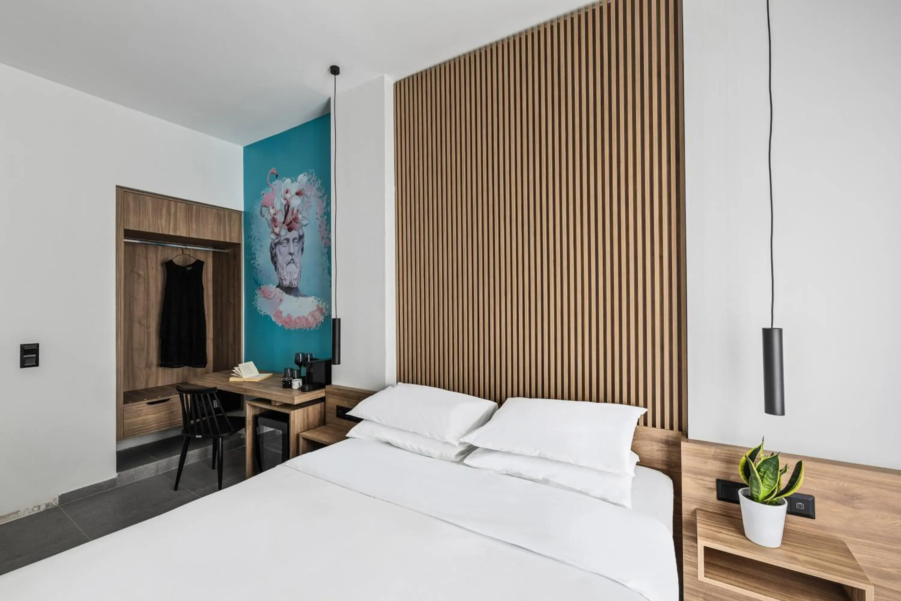 Bed in The Q Hotel Bed in The Q Hotel