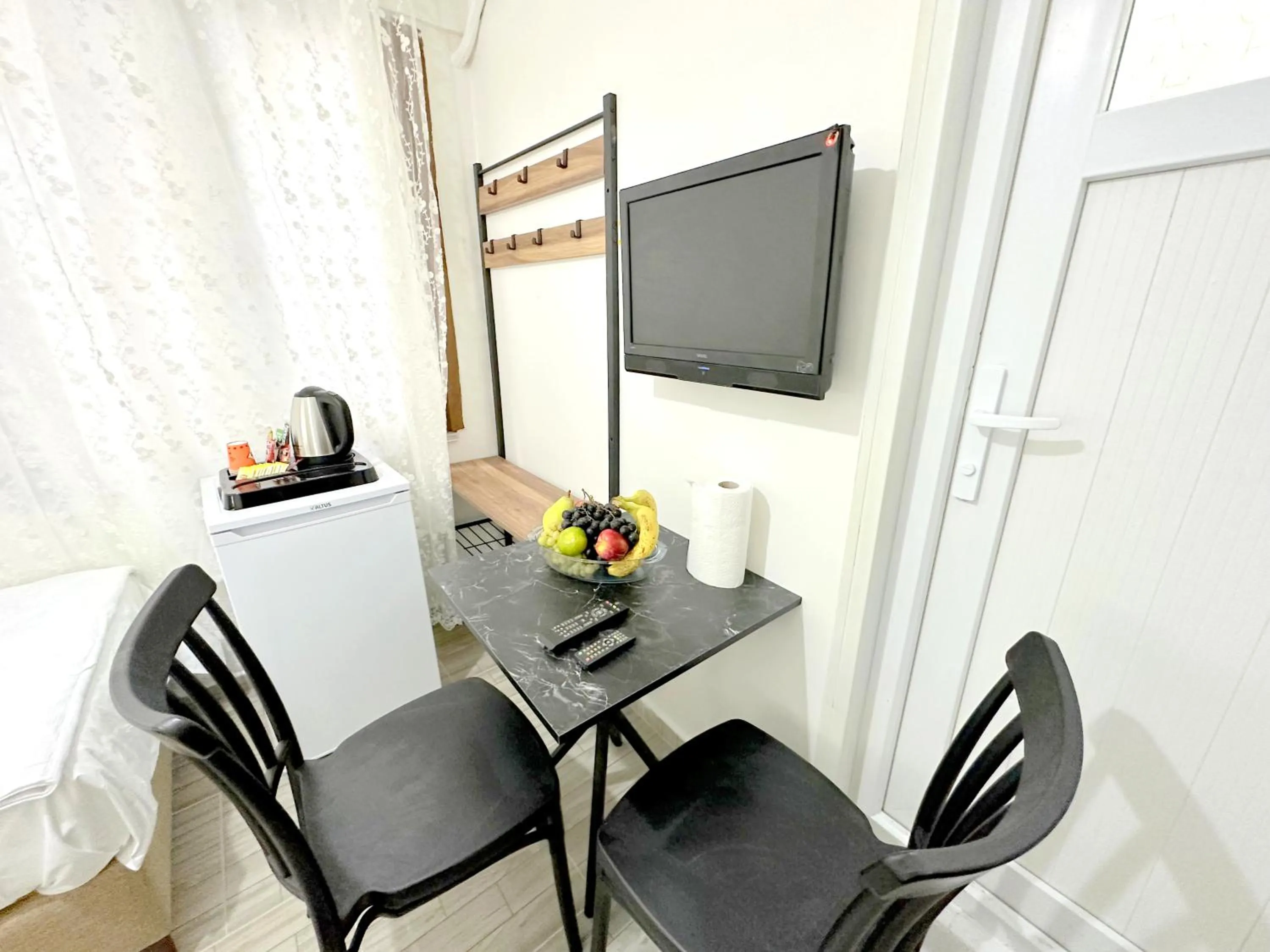 TV and multimedia in Menesa Hotel