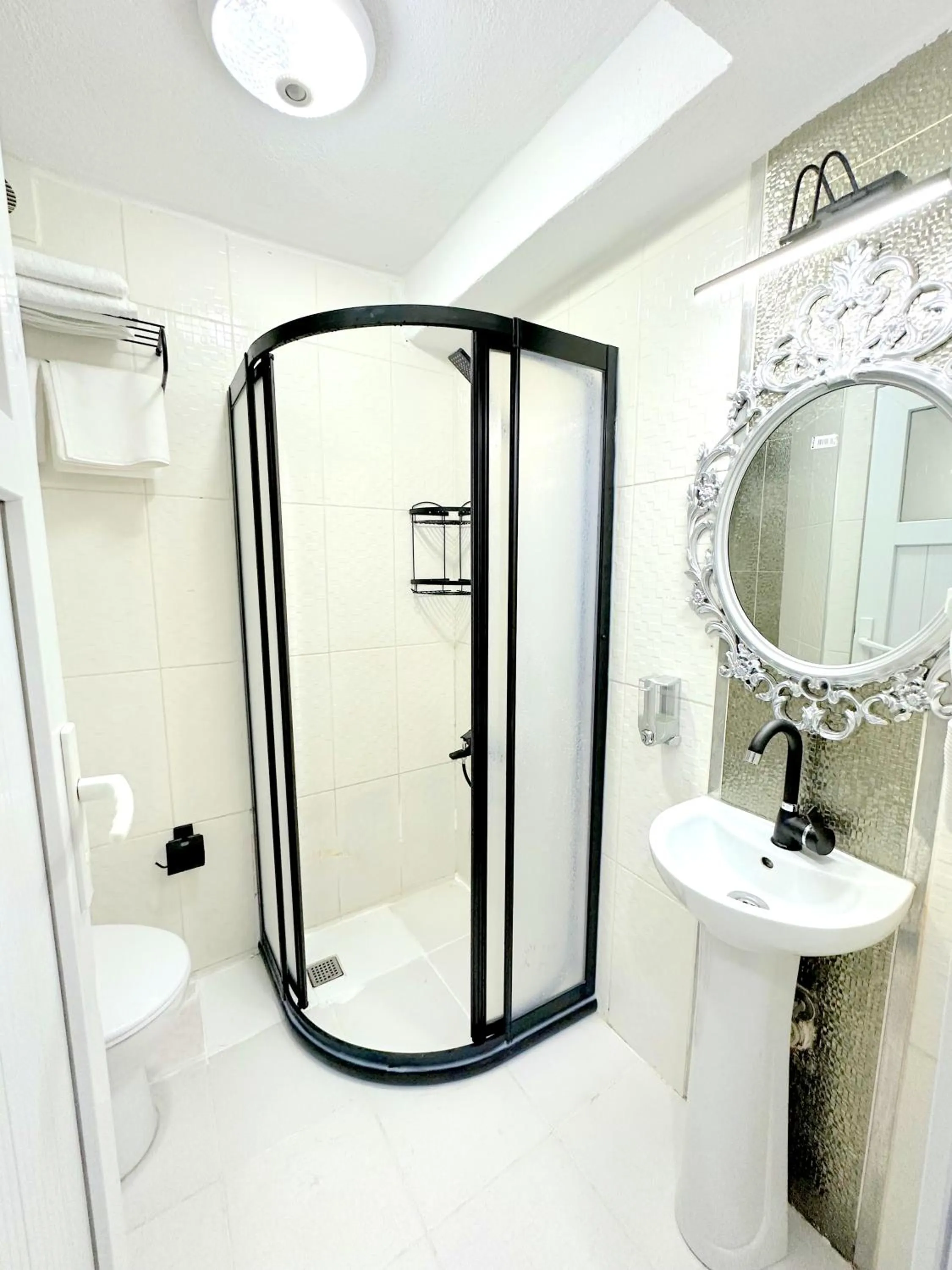 Shower in Menesa Hotel